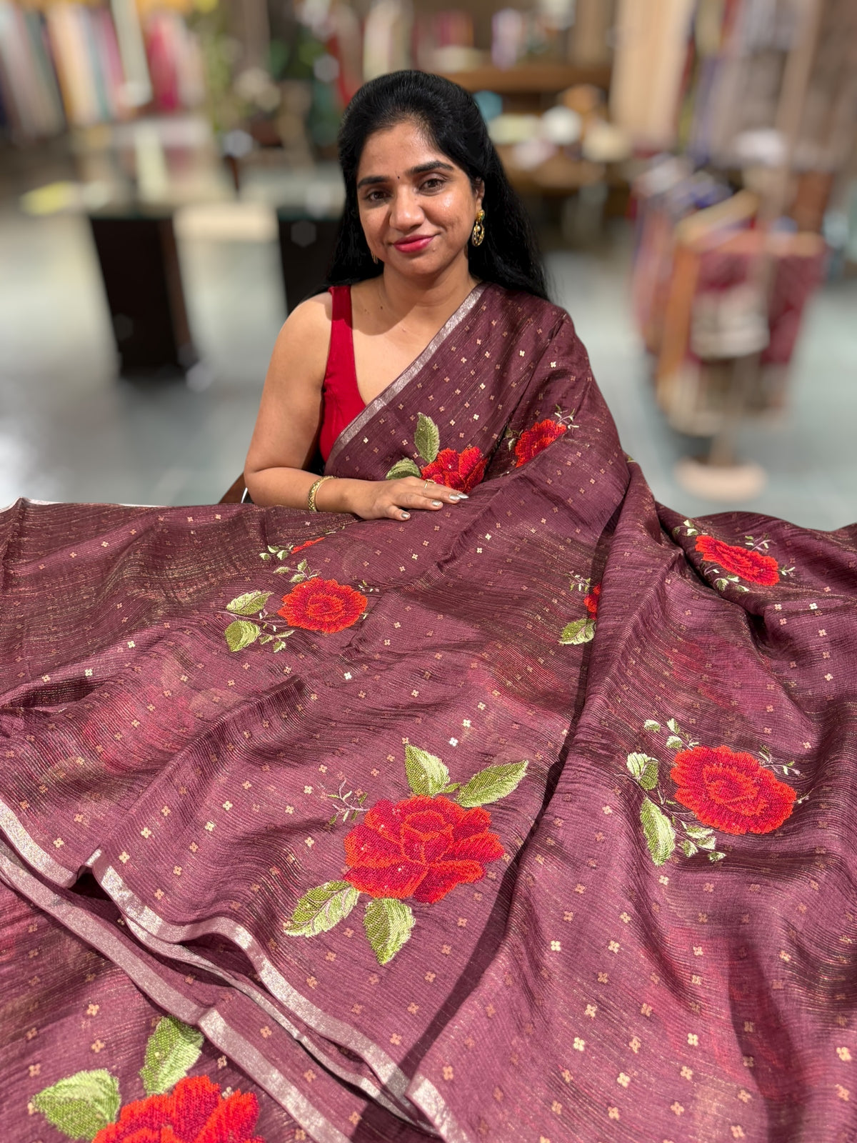 Winish brown Tussar Kota Saree with embedded sequnce and hibuscus flower embroidery