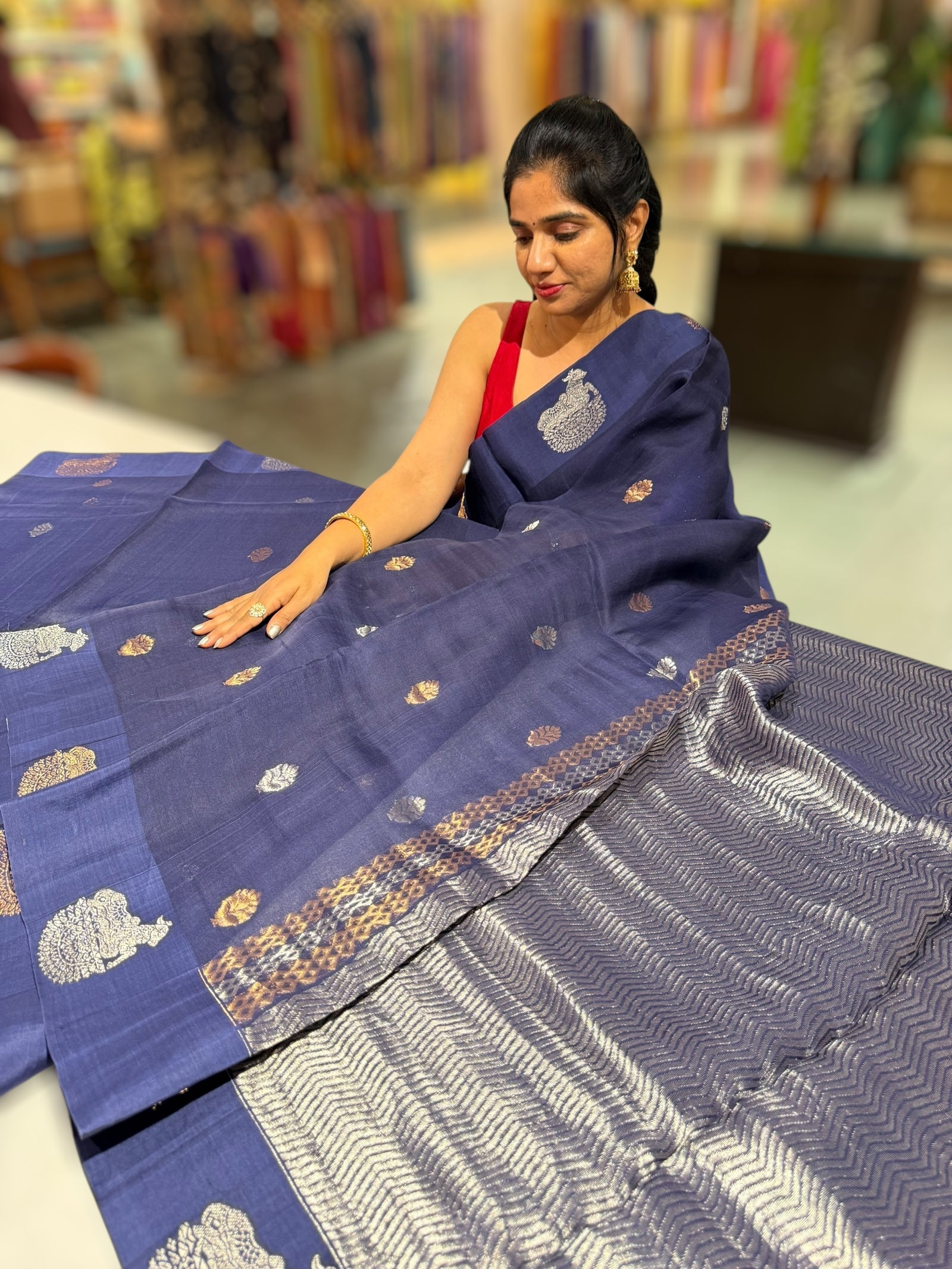 Midnight Blue  kora muslin sarees with kaduwa woven nandi motif border