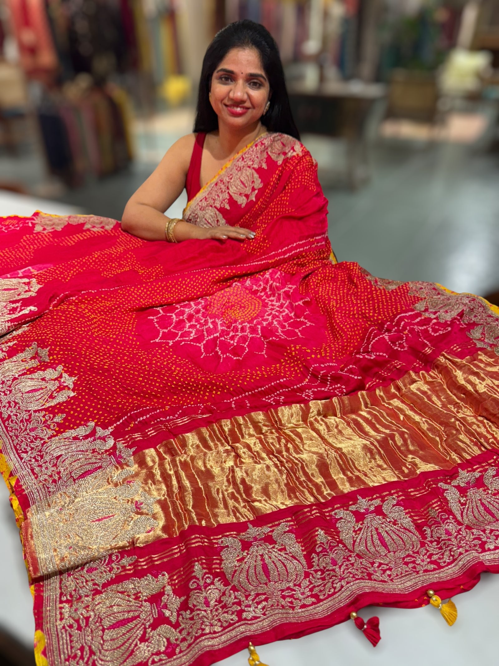 Reddish Pink Designer Rai Bandhej Saree With Embroidered Border