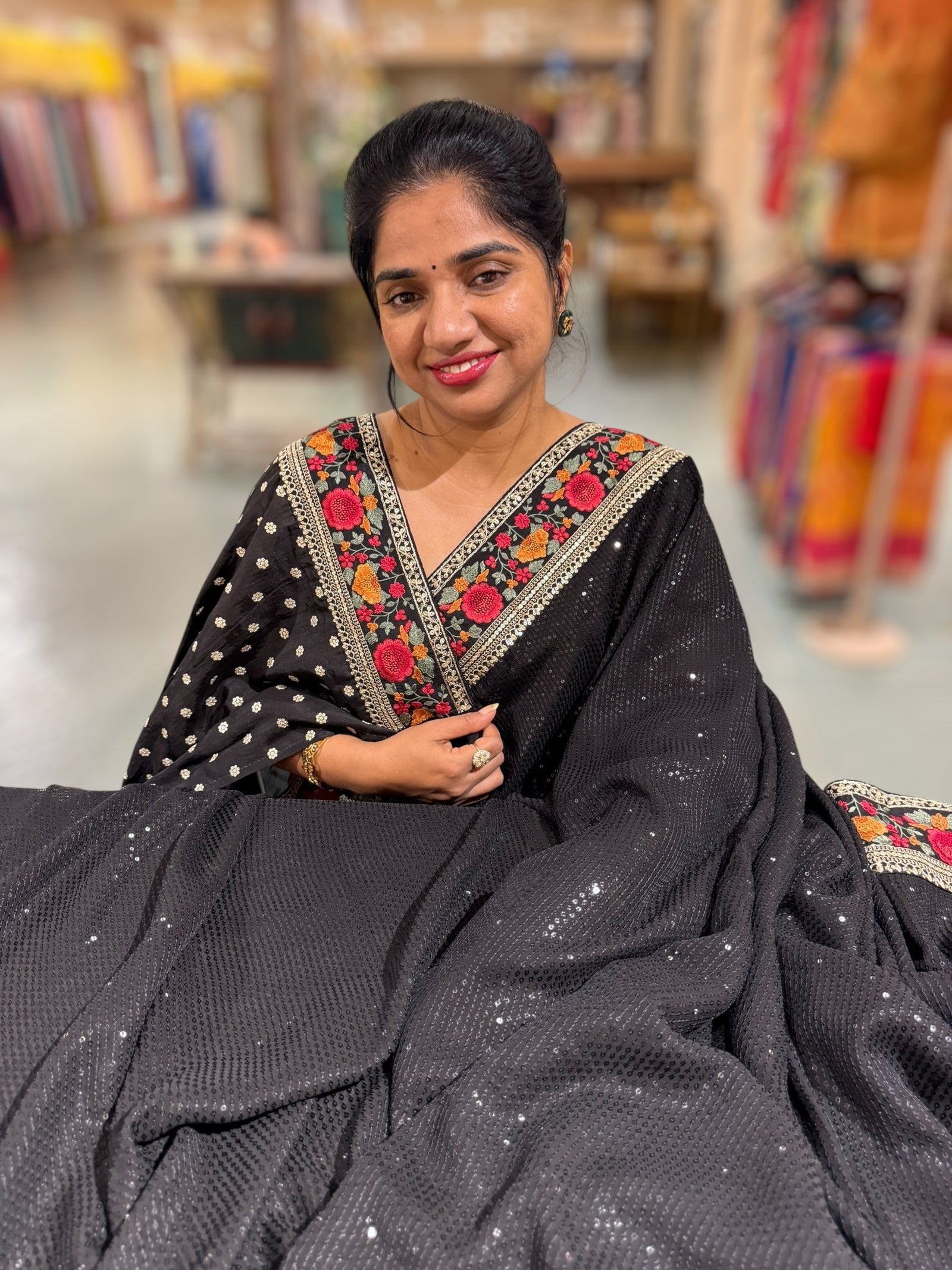 Black Georgette sequnce Saree with Sabyasachi borders and Blouse