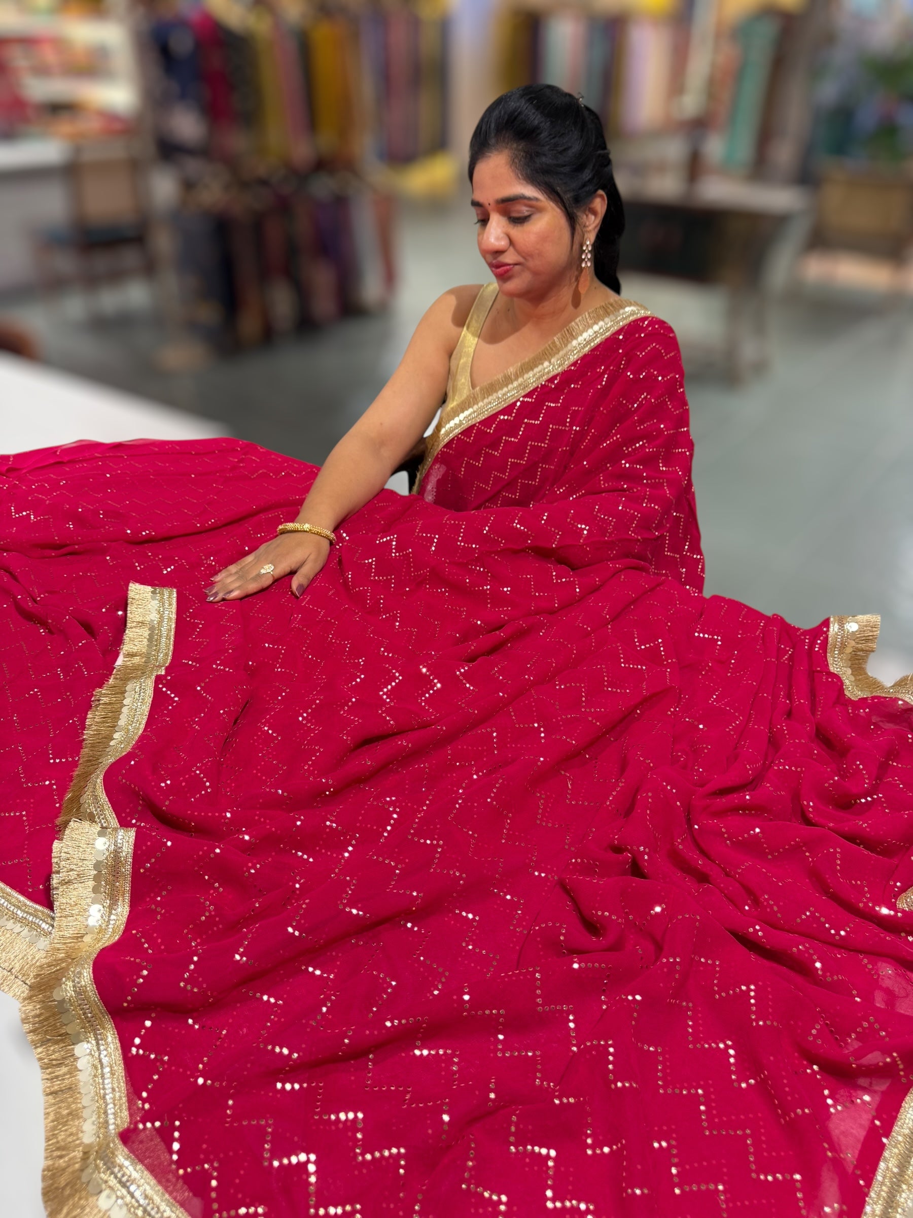 Dark Pink Georgette Saree with stick on Badla in zigzag pattern