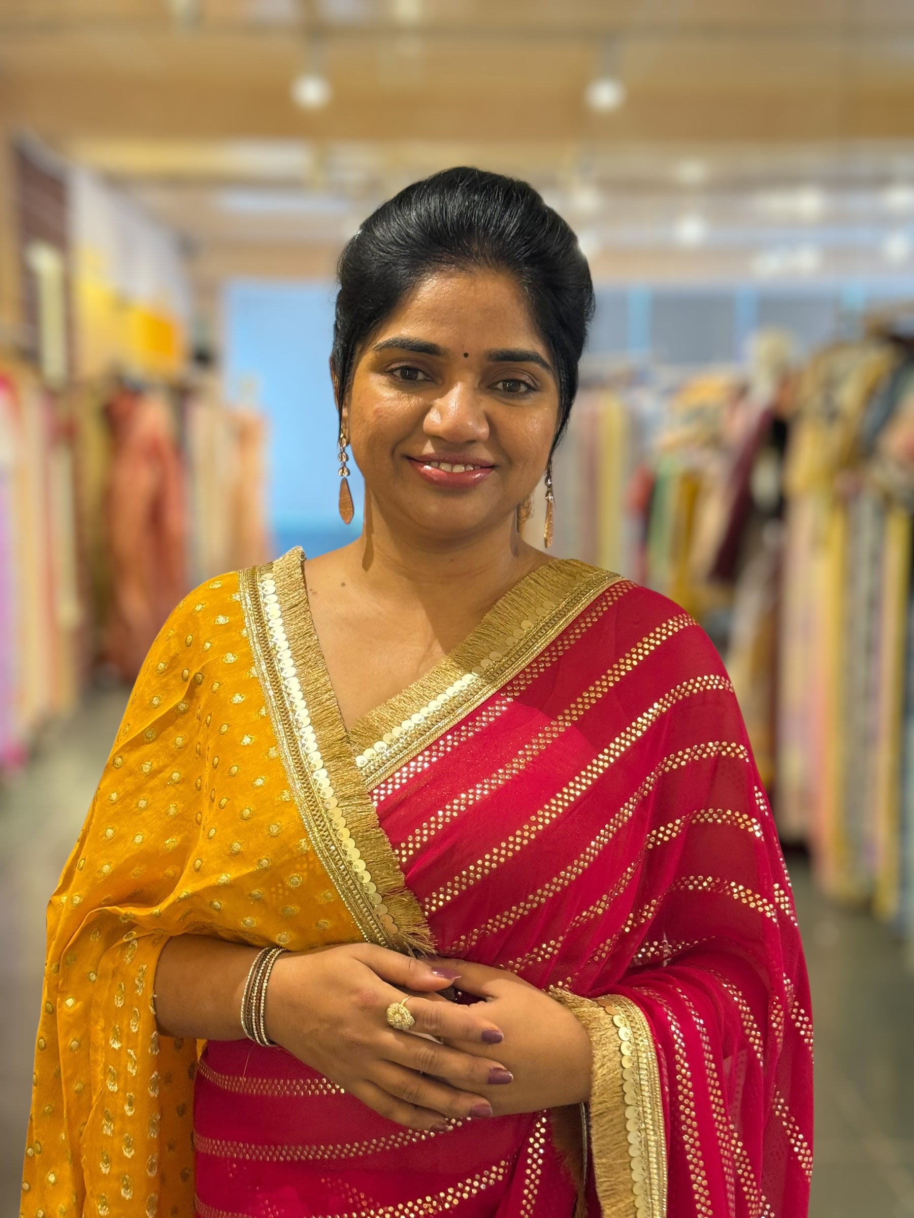 Dark Pink Georgette Saree with stick on Badla in stripes pattern and kiran Lace