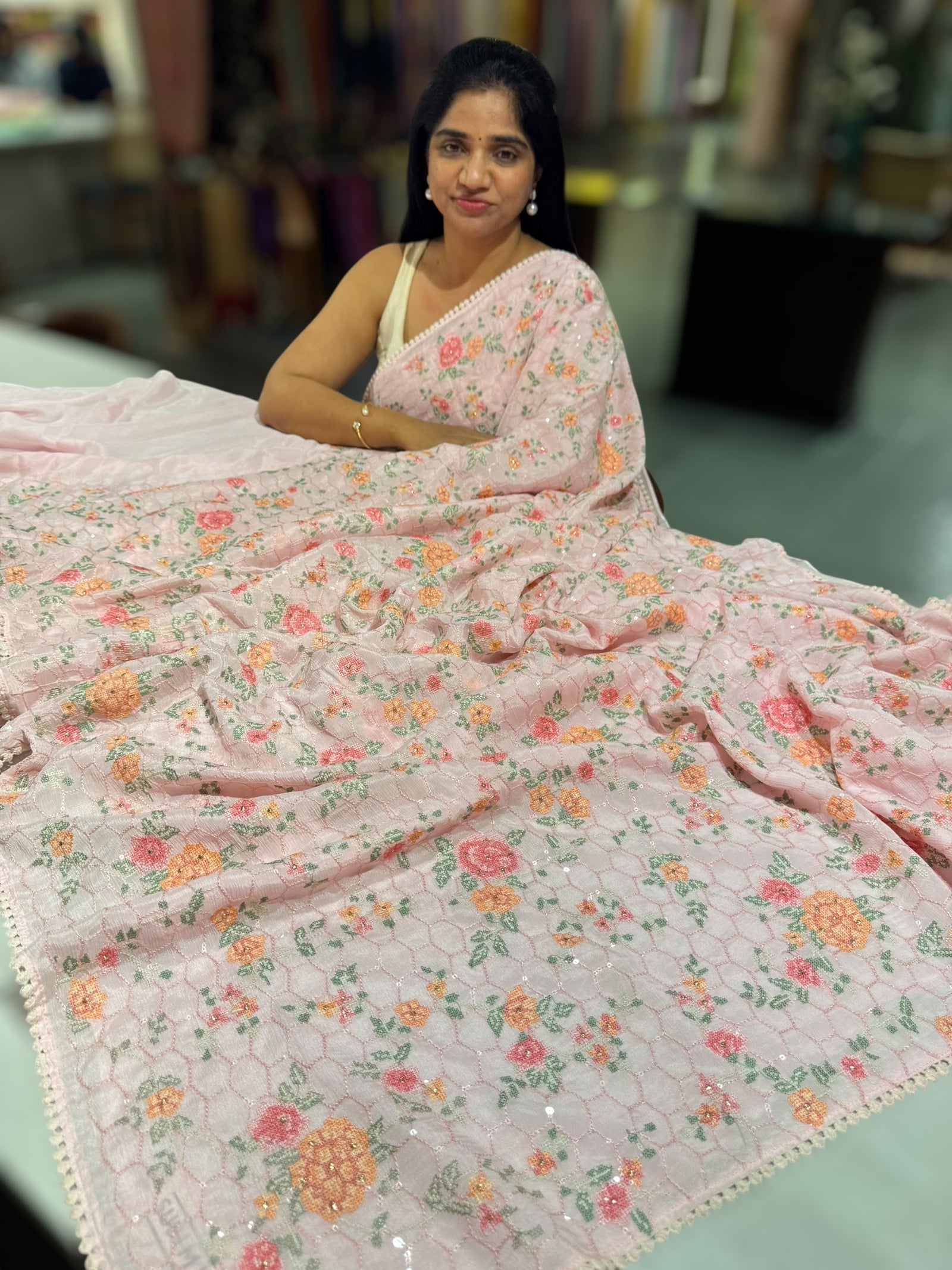 Baby Pink Chinnon saree with allover petite point embroidery