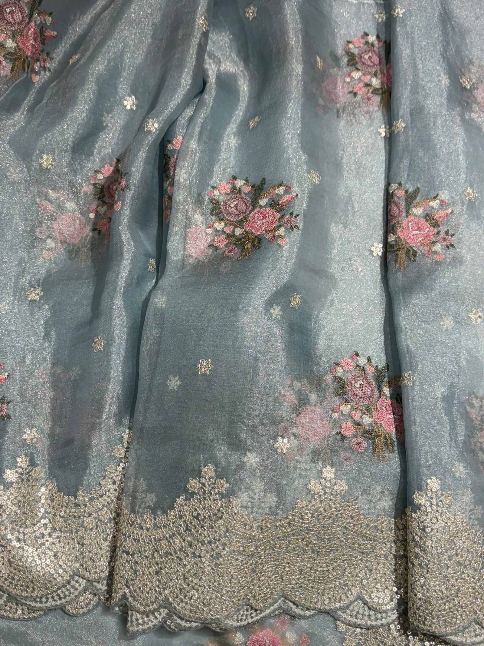 Pastel Blue Tissue Saree With allover Petite Point Motifs & Pittai Sequence Borders