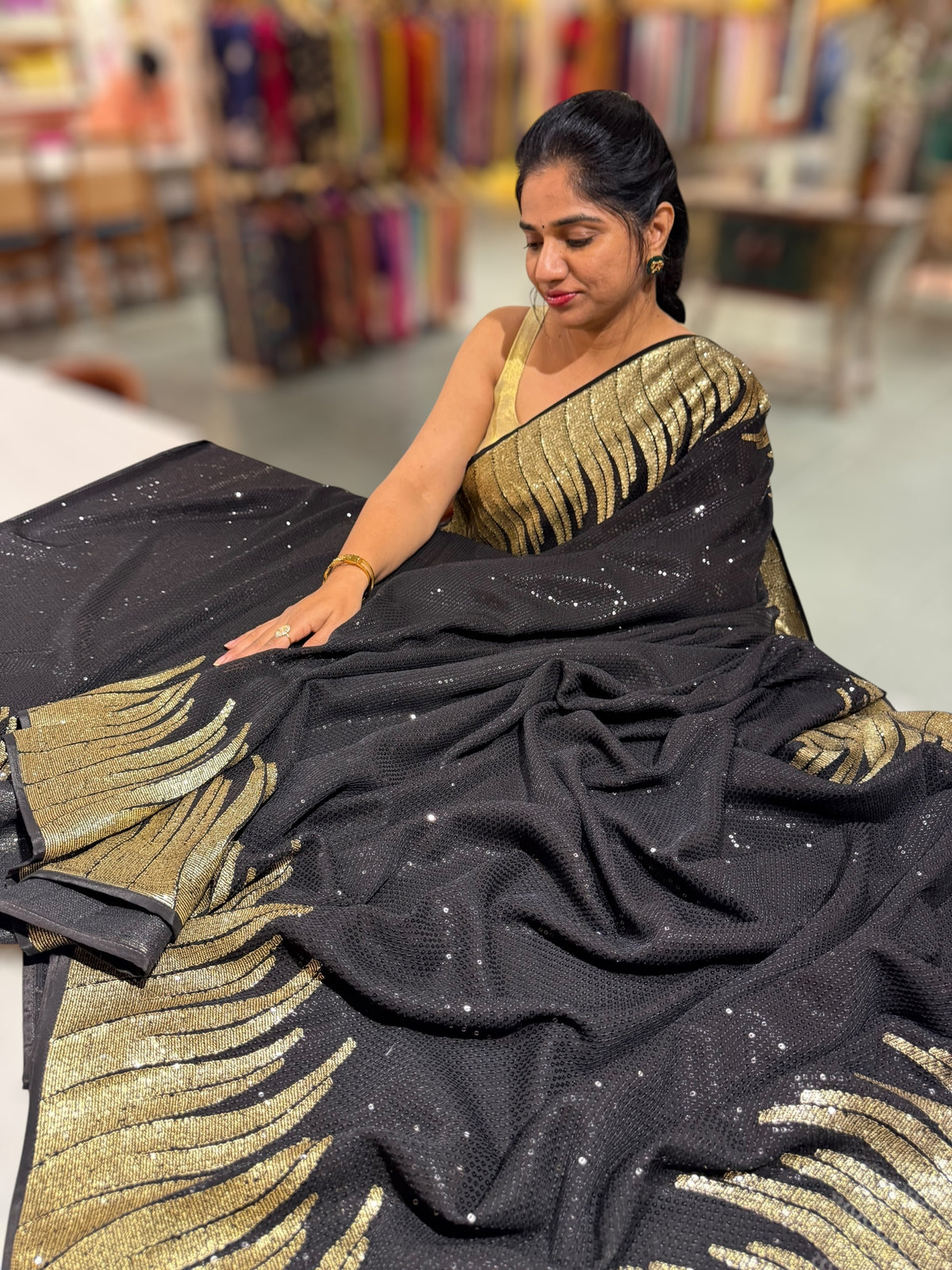 Black Georgette Saree with stunning Gold embroidered Border