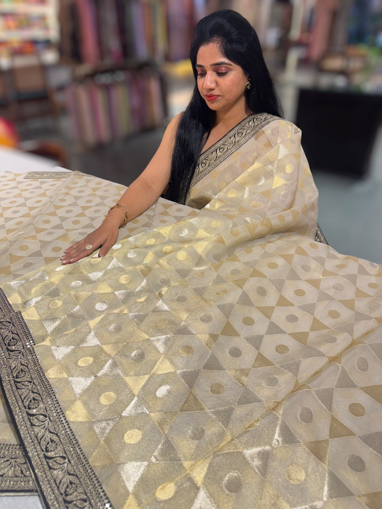 Beige Tissue Saree with Black Sabhyasachi borders