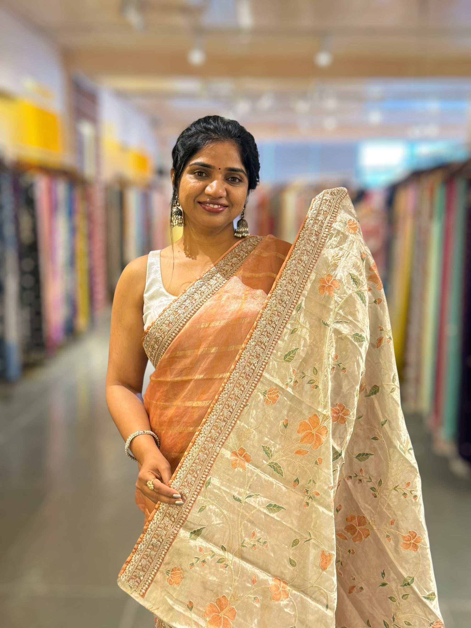 Peach Banarasi Tissue checks Saree with Sabyasachi Borders