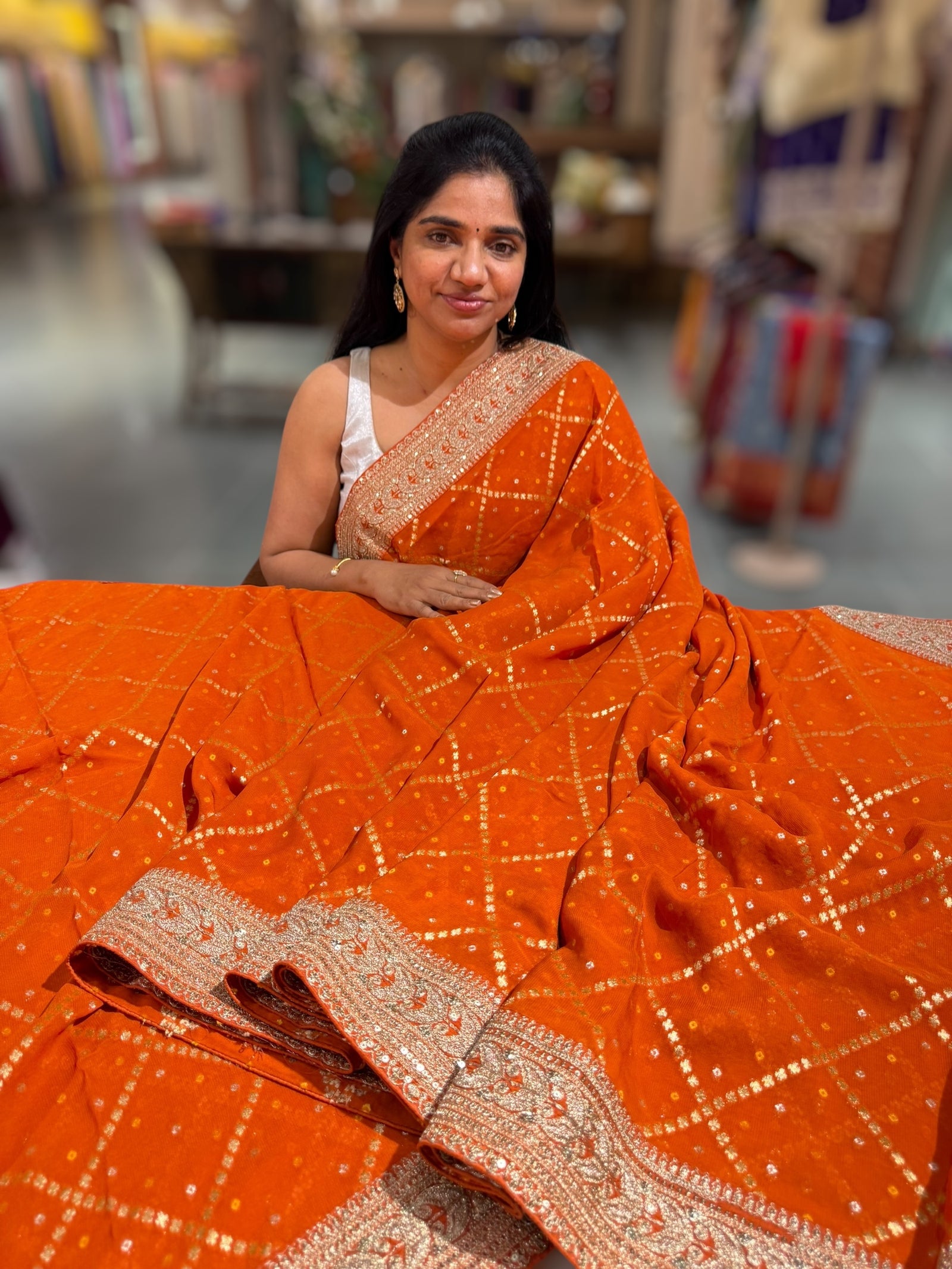 Orange Fancy Banarasi Bandhini georgette saree with sabhyasachi borders and blouse