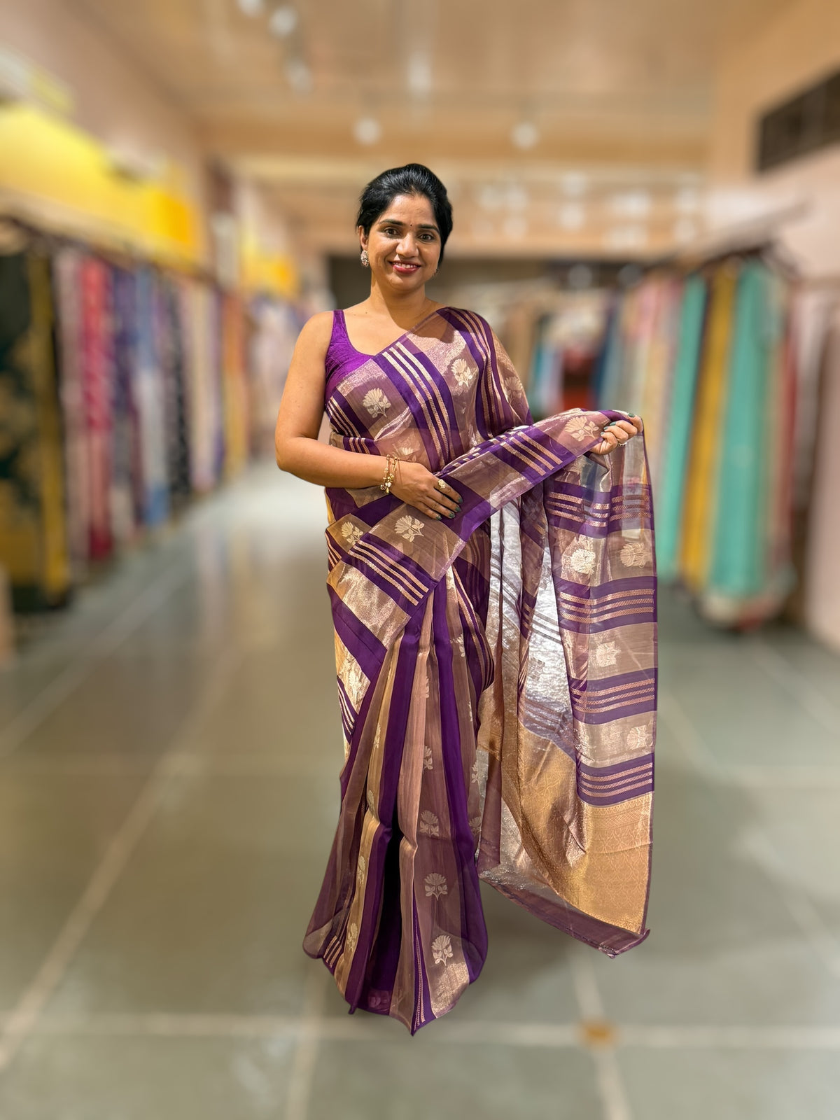Purple Banarasi Handloom Kora Tissue Stripes with allover kaduwa woven lotus  motifs .