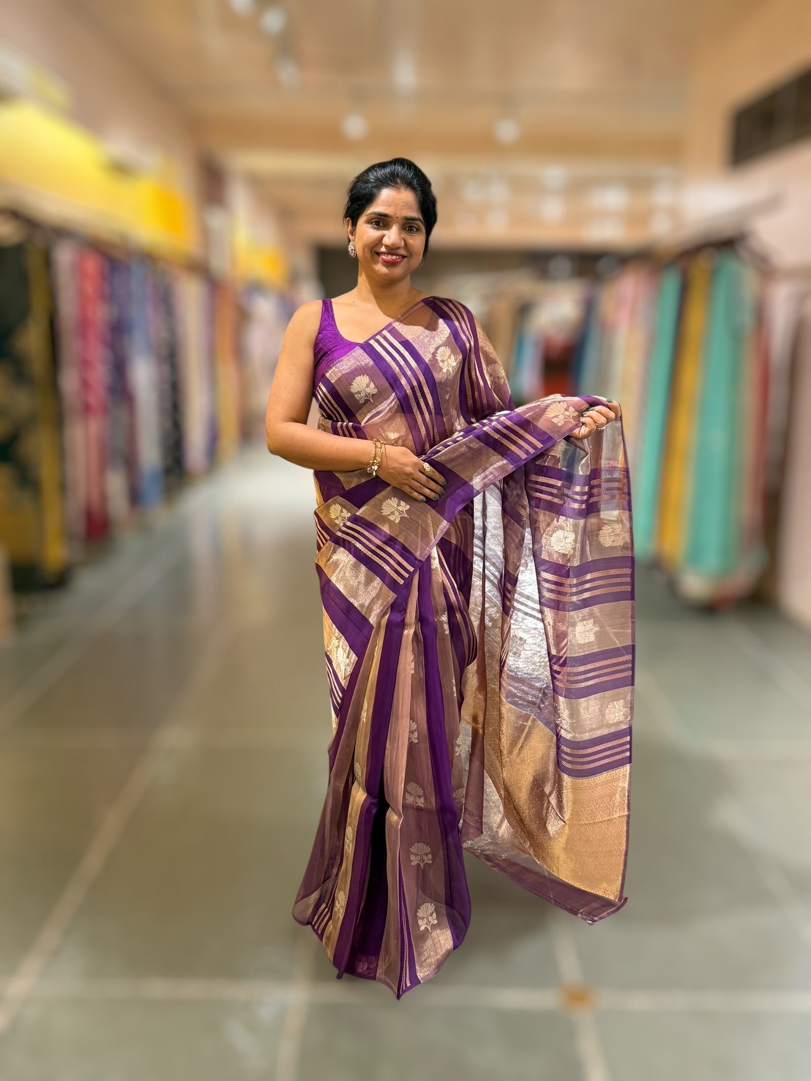 Purple Banarasi Handloom Kora Tissue Stripes with allover kaduwa woven lotus  motifs .