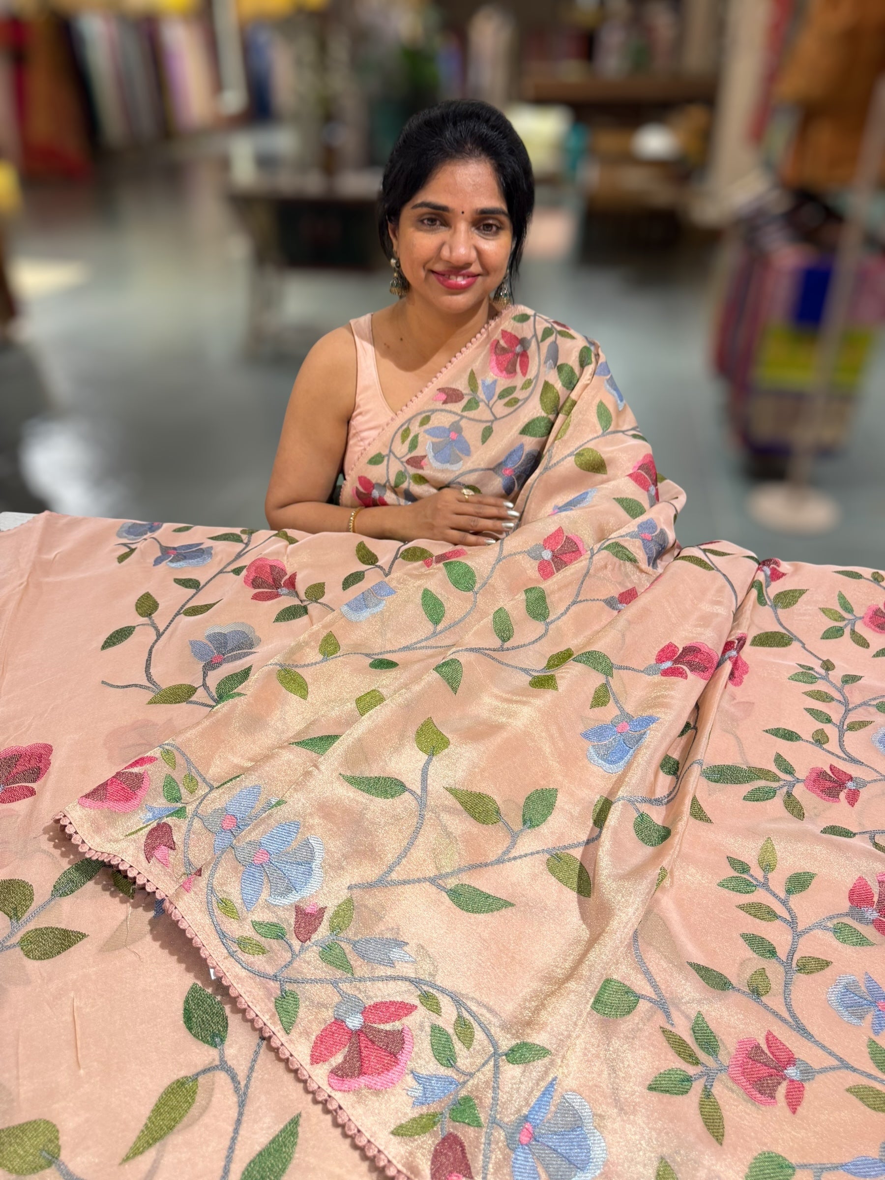 Peach Tissue georgette saree with allover jamdani inspired embroidery