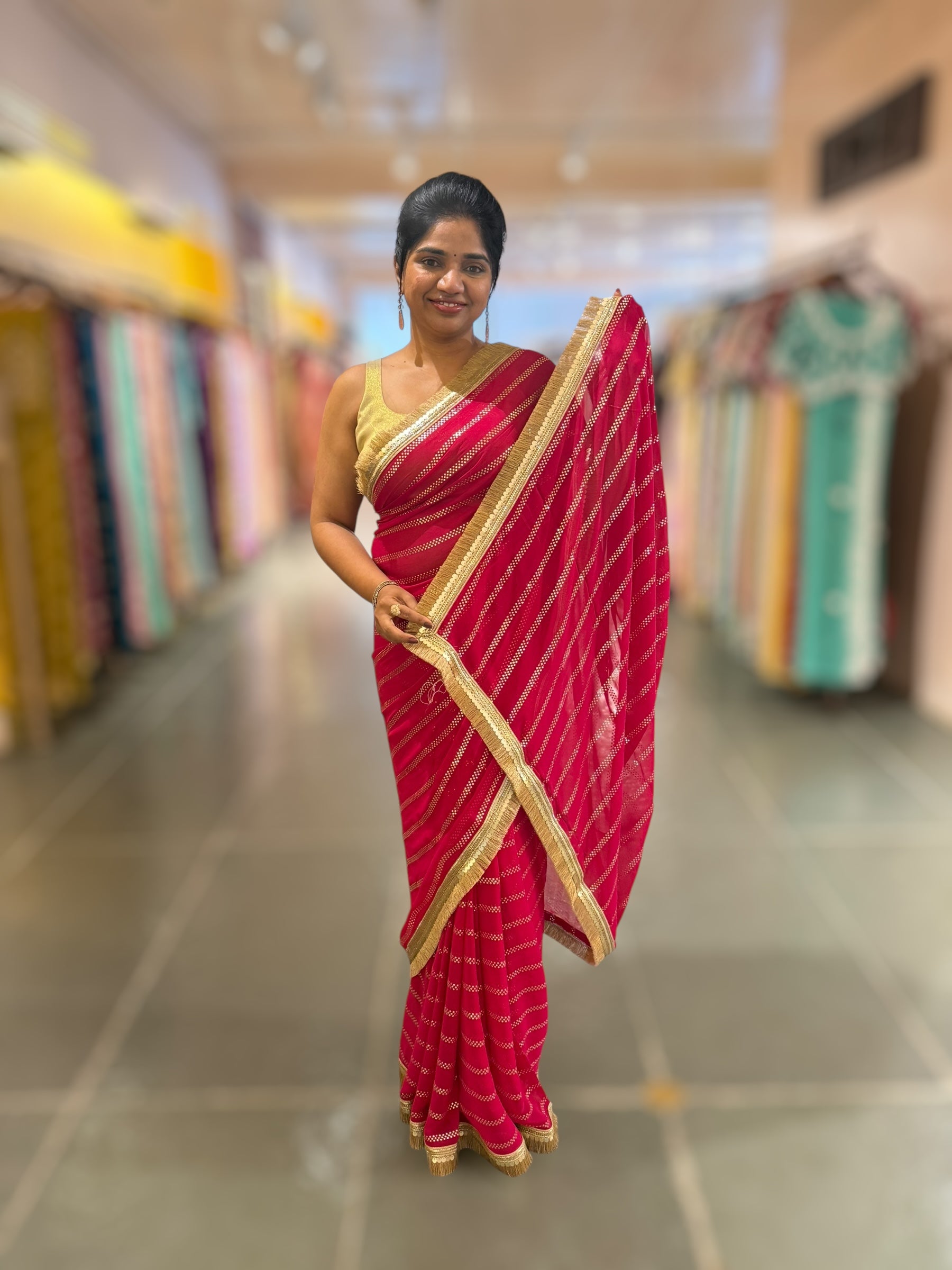 Dark Pink Georgette Saree with stick on Badla in stripes pattern and kiran Lace