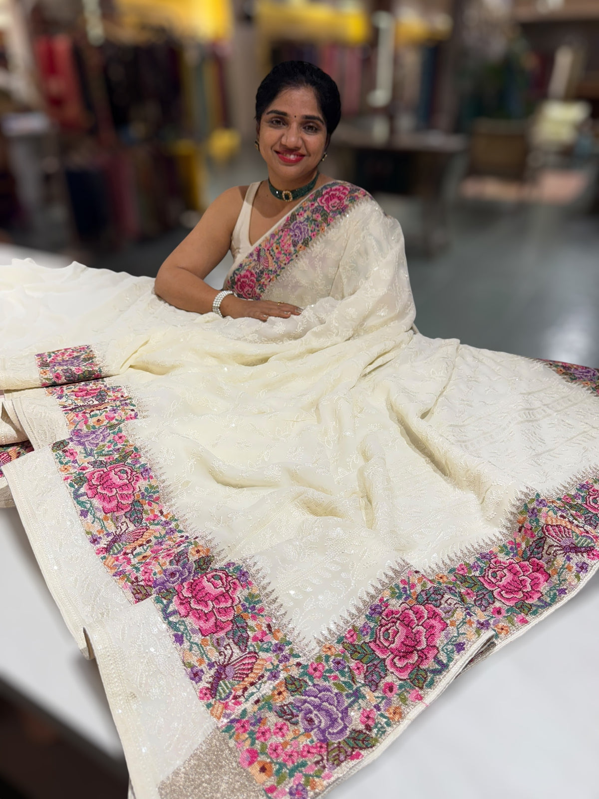 Halfwhite Georgette Saree with allover Chikankari Embroidery and Petite Point border