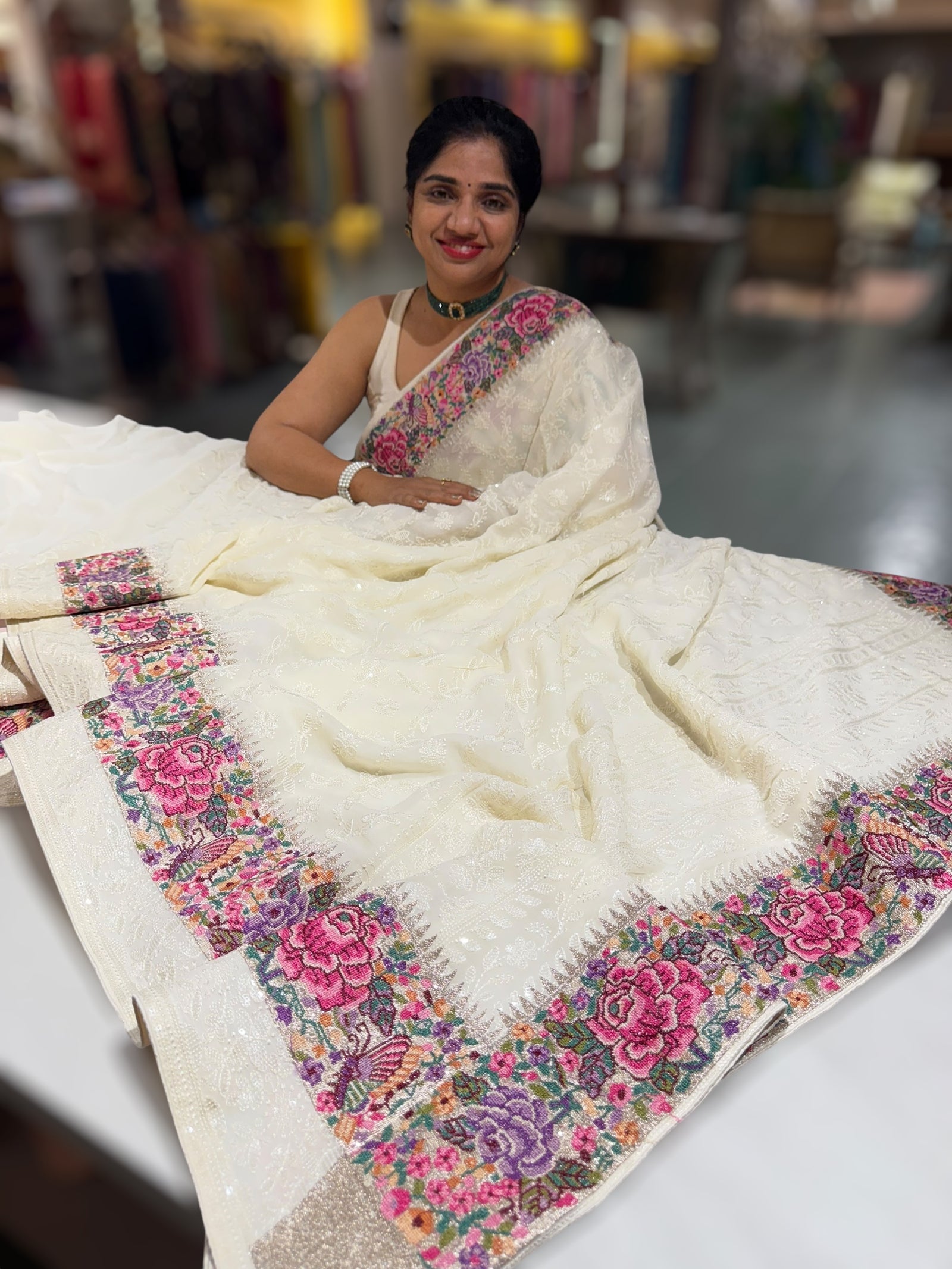 Halfwhite Georgette Saree with allover Chikankari Embroidery and Petite Point border