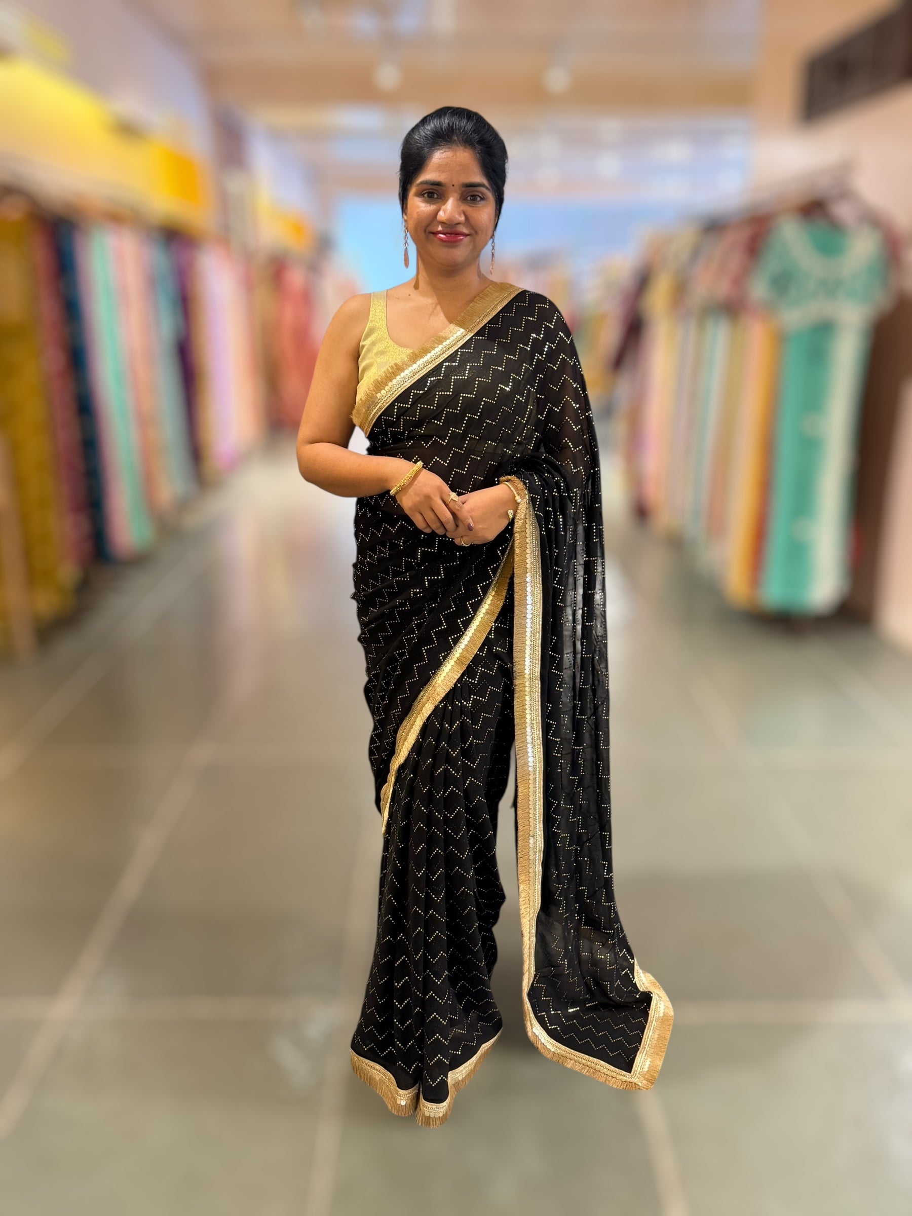 Black Georgette Saree with stick on Badla in zigzag pattern