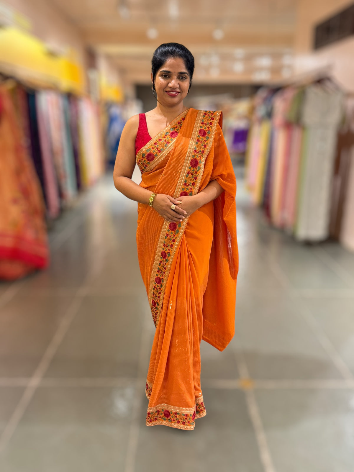 Orange Georgette sequnce Saree with Sabyasachi borders