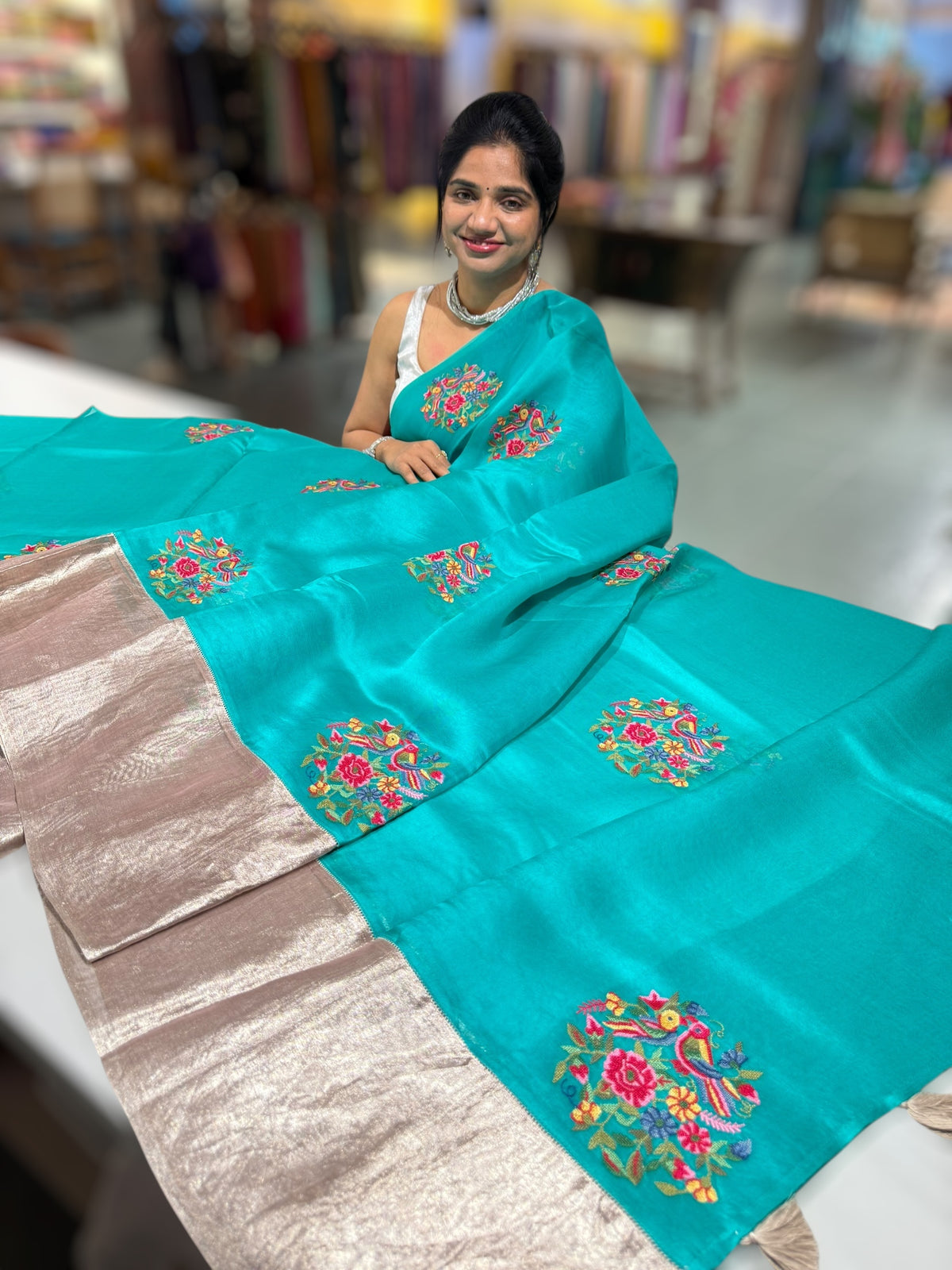 Teal Organza Saree with pure Tissue Border