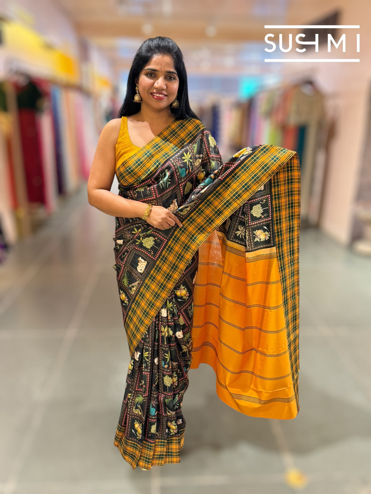 Black printed soft silk saree with burberry checks border : D62F033