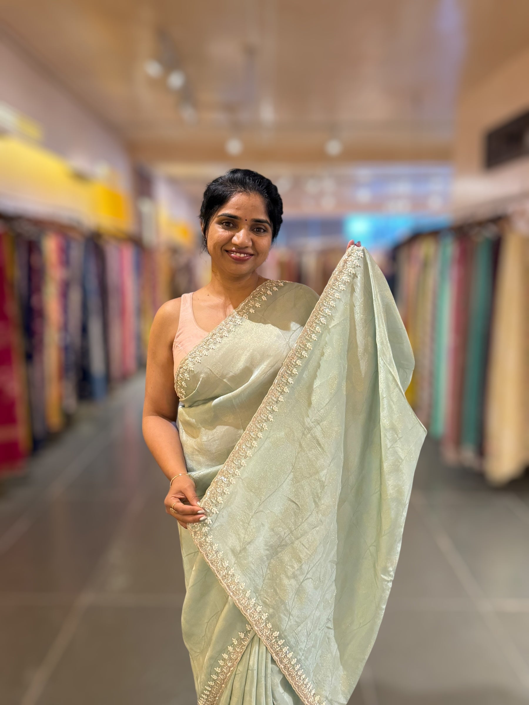 Pastel Blue Tissue Gorgette Saree With Hanwork Border and Blouse.