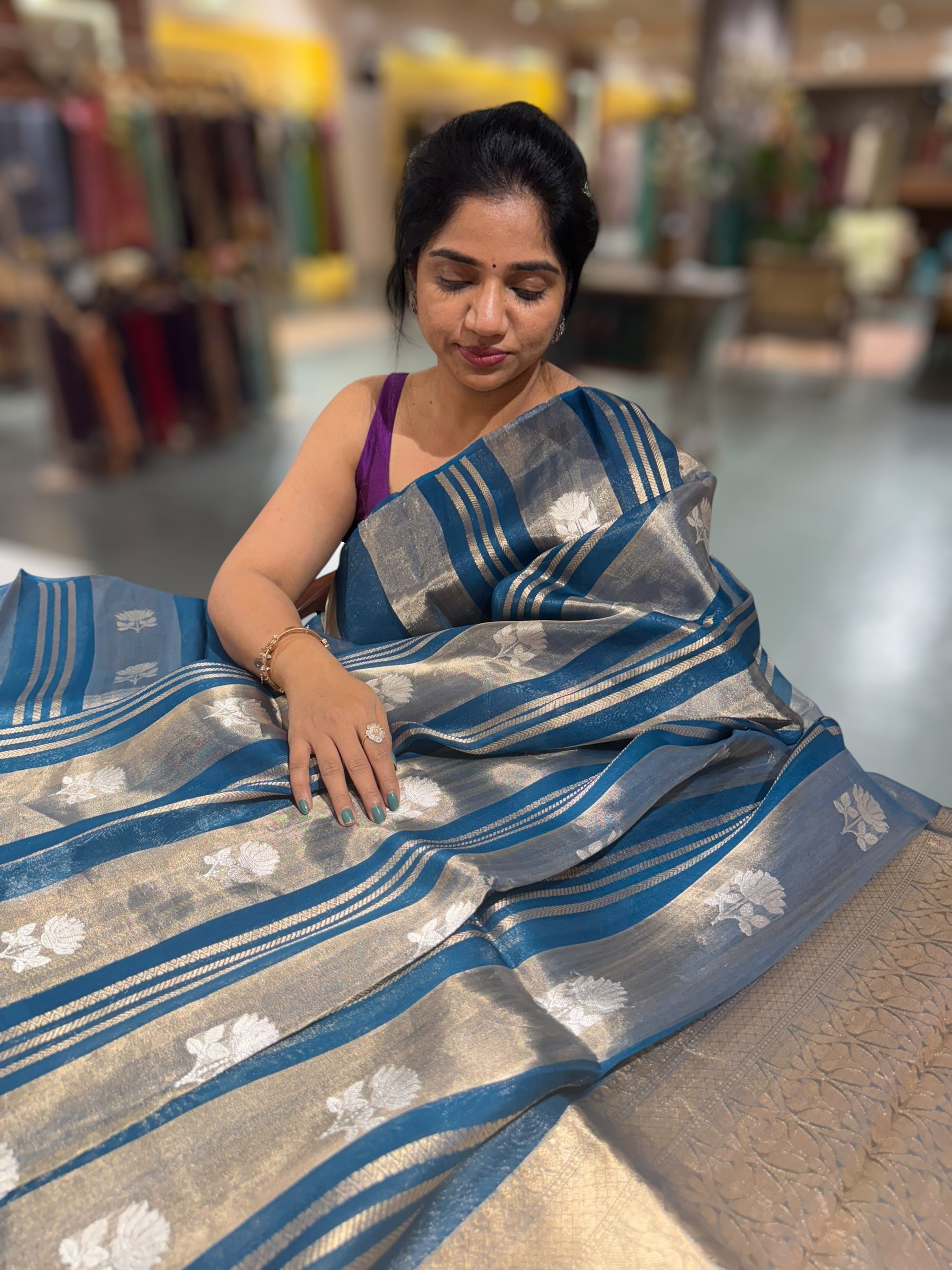 Peacock Blue Banarasi Handloom Kora Tissue Stripes with allover kaduwa woven lotus  motifs .