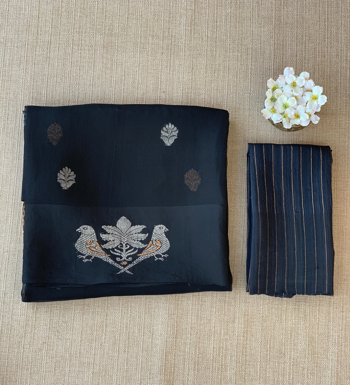 Black kora muslin sarees with kaduwa woven nandi motif border