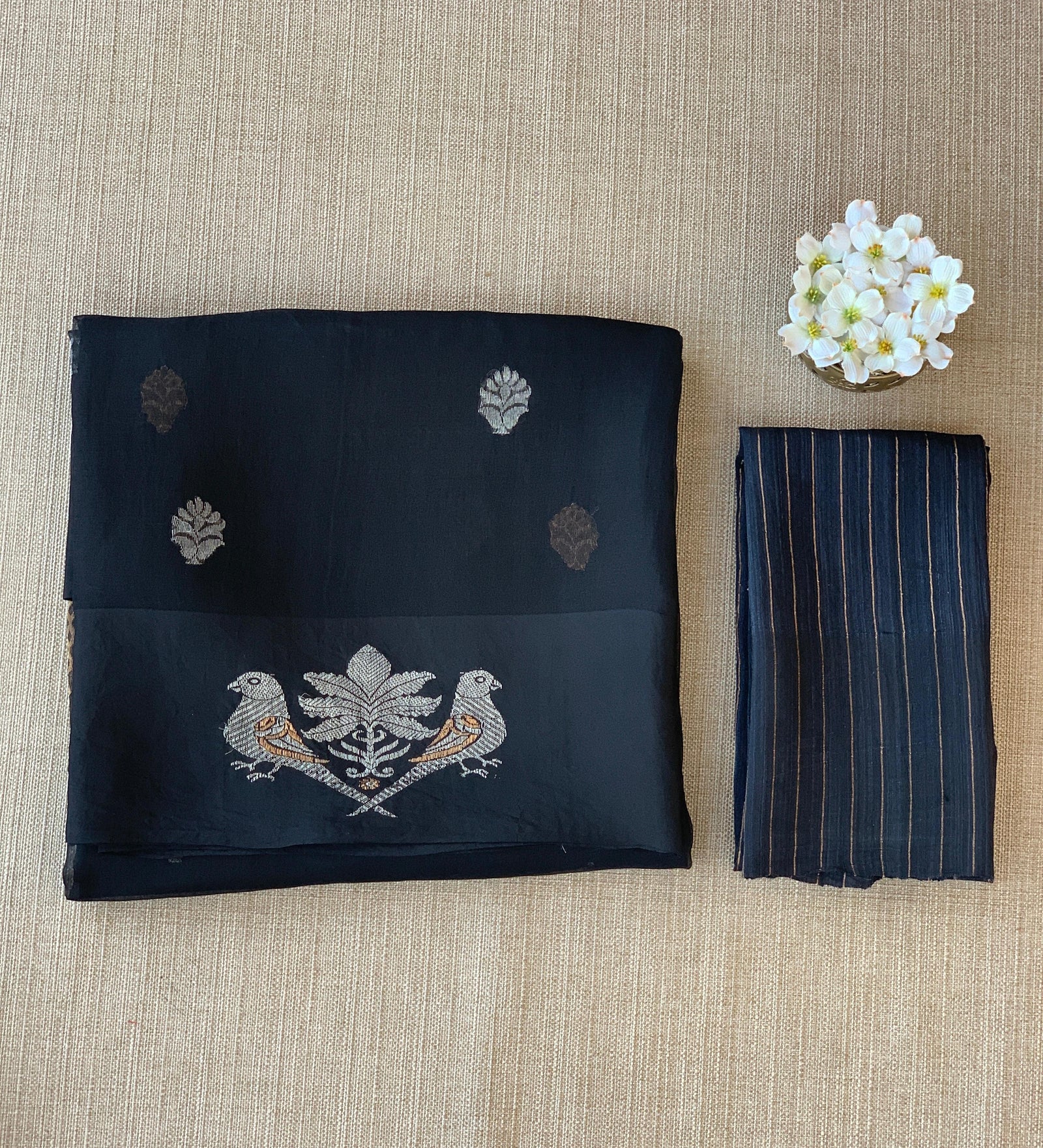 Black kora muslin sarees with kaduwa woven nandi motif border