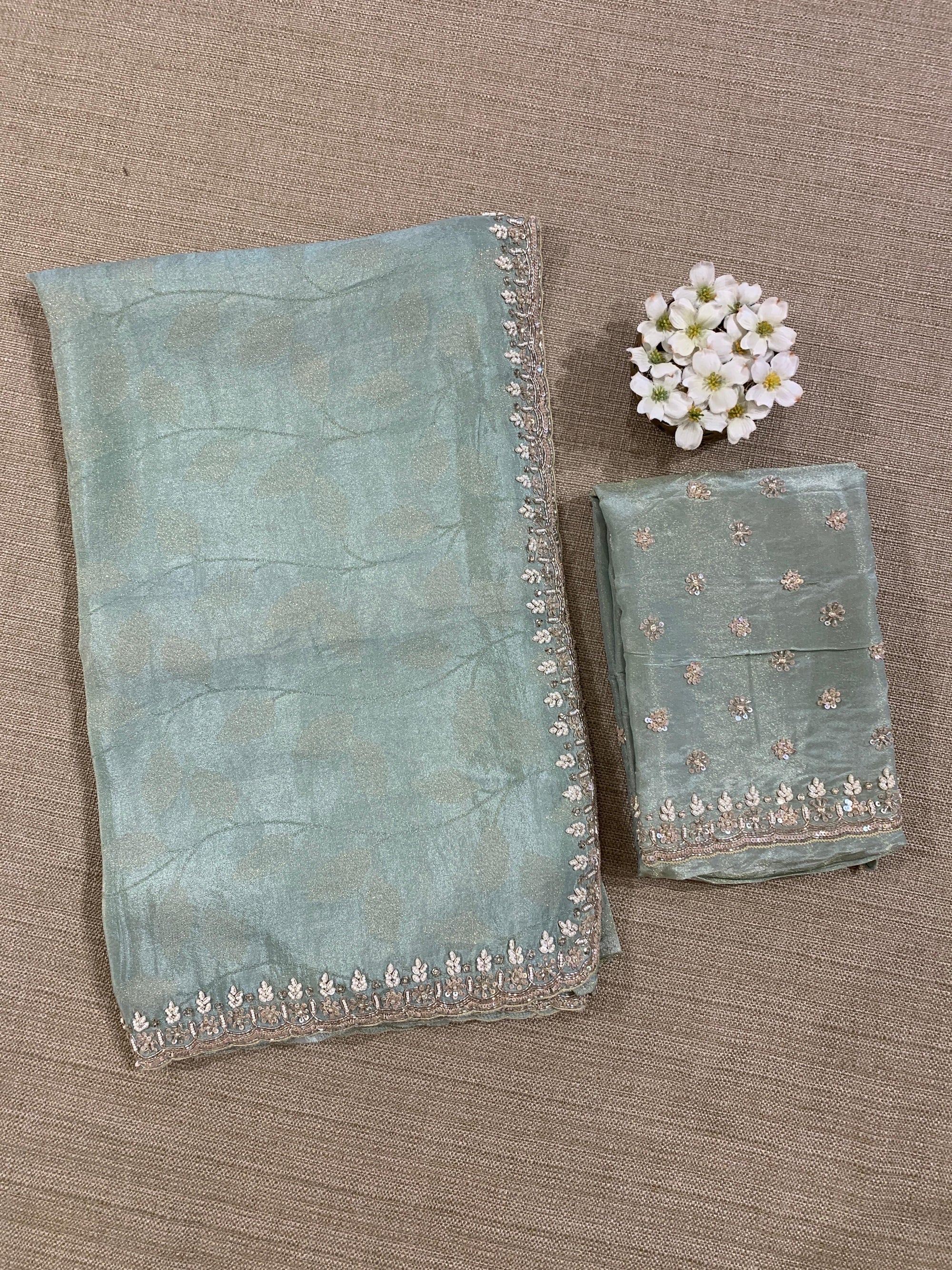Pastel Blue Tissue Gorgette Saree With Hanwork Border and Blouse.