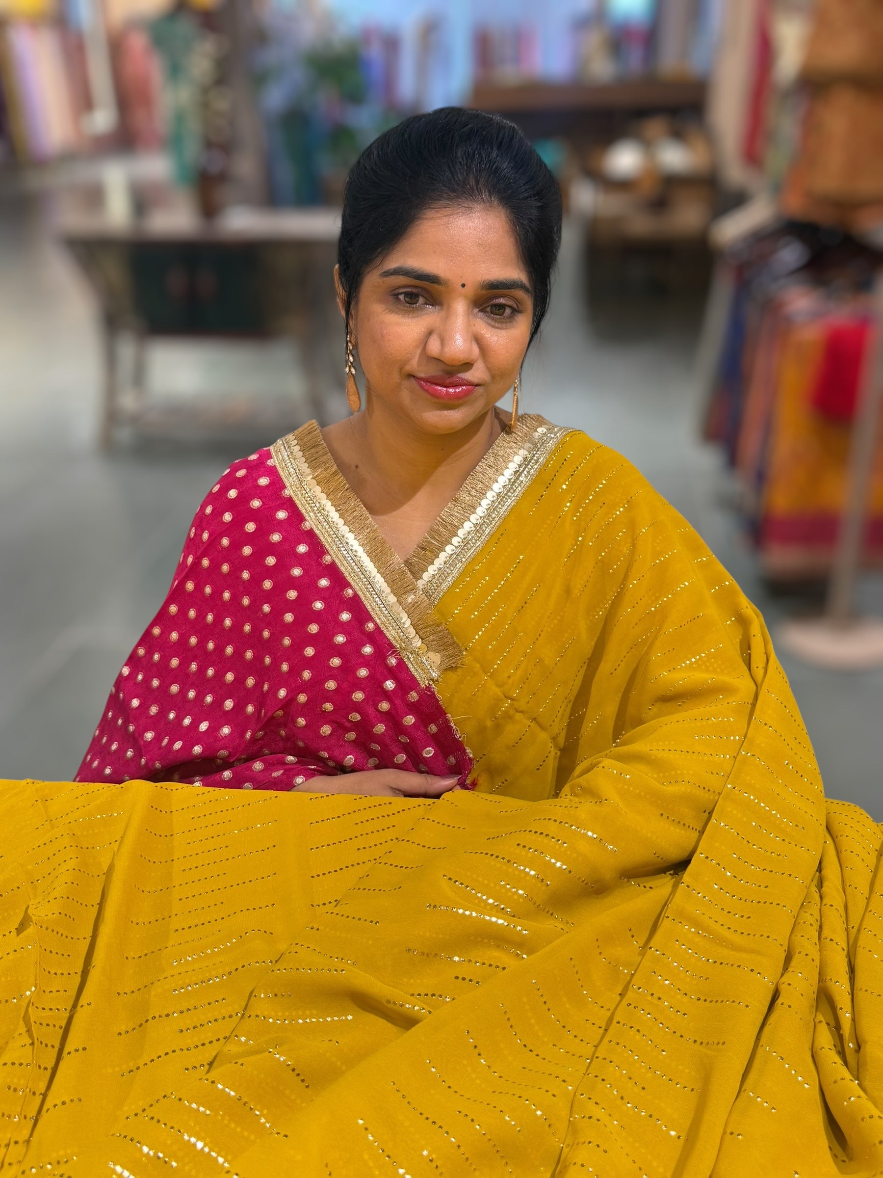 Yellow light Georgette Saree with stick on Badla in stripes pattern and kiran Lace