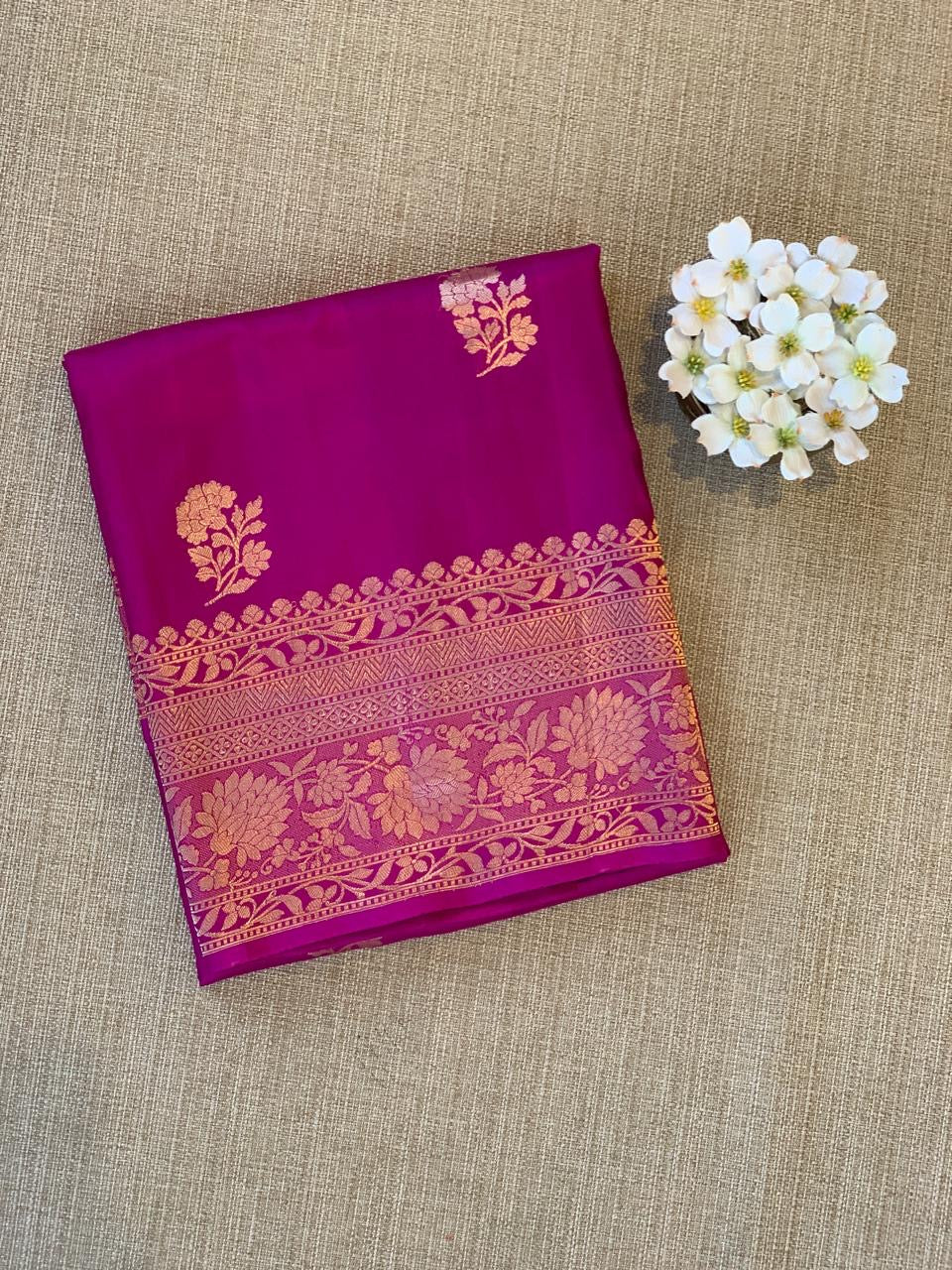 Majenta Raw Mangoe Silk Saree in Monotone Look & kaduwa woven motifs.