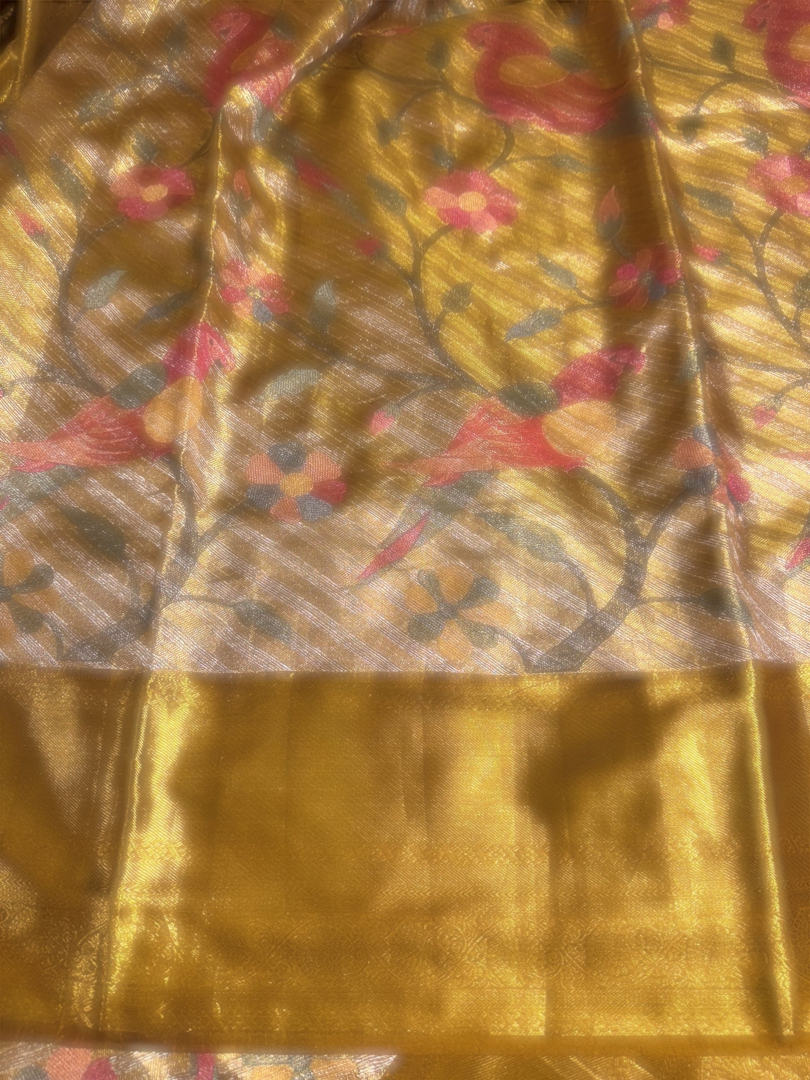 Molten Gold Kanjeevaram Tissue Saree with allover embroidery