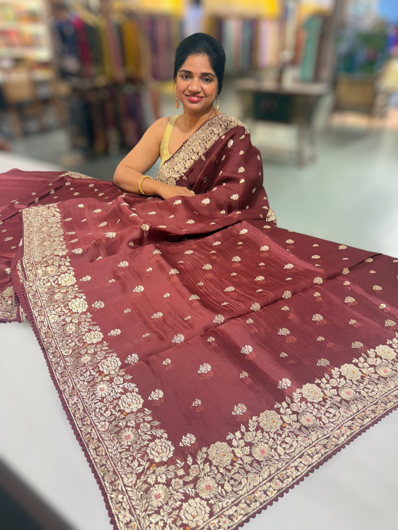 Meroonish Brown  Organza Saree with stunning heavy zari embroidered border and alloevr motifs