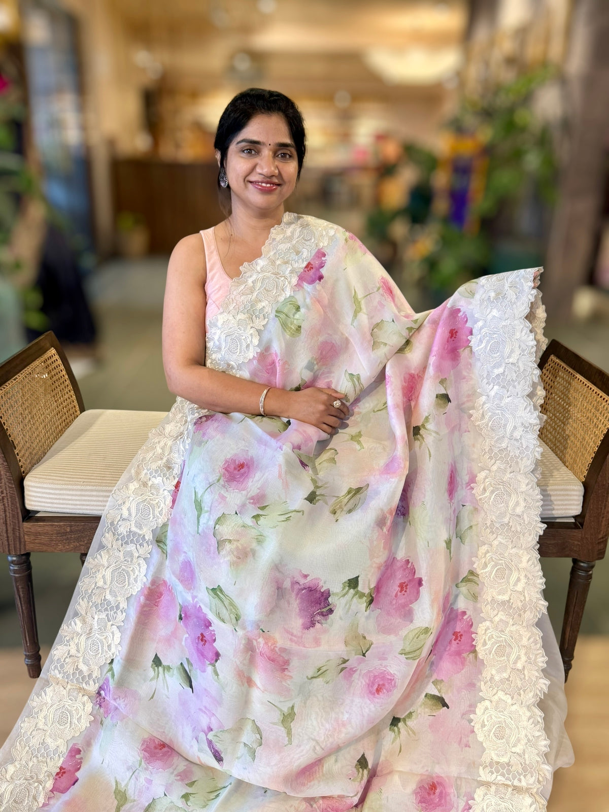Ivory Printed Organza Saree With Chantilly Lace Style Embroidered Border.