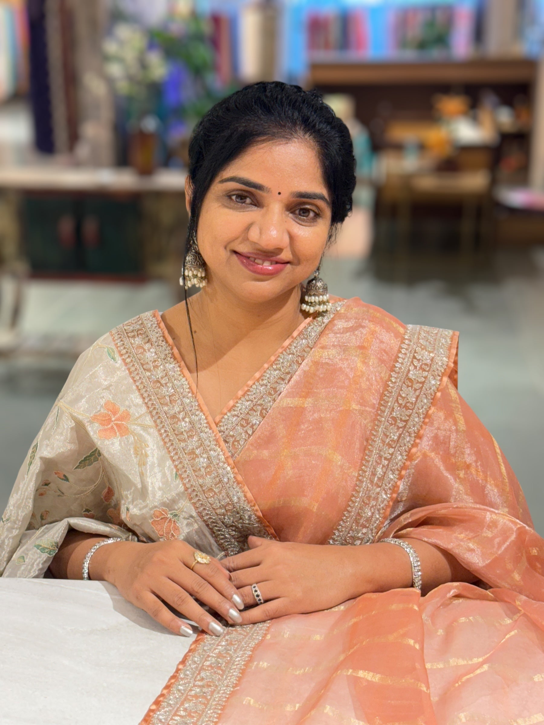 Peach Banarasi Tissue checks Saree with Sabyasachi Borders
