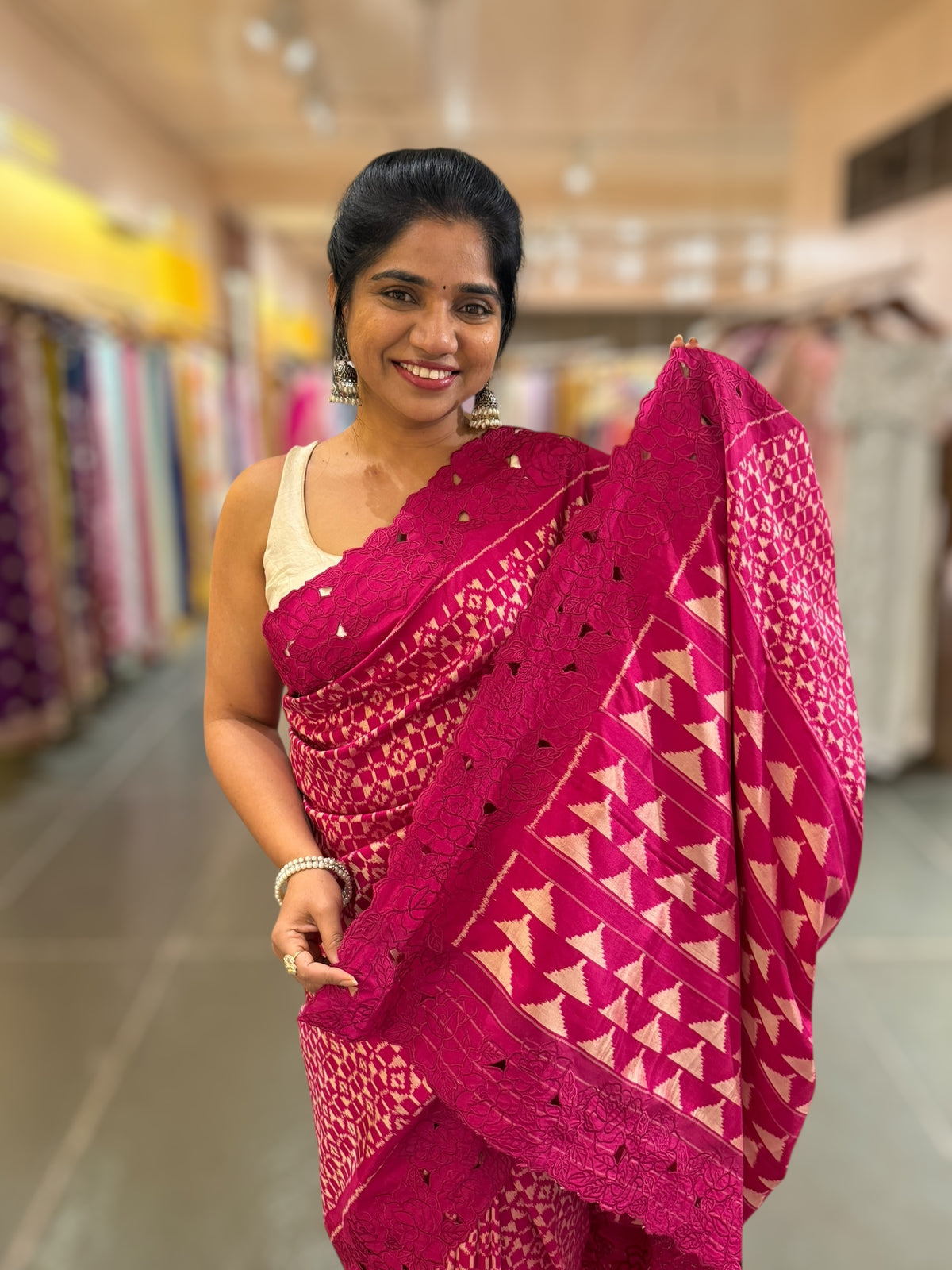 Beetroot Pink Cambodian–inspired Ikkat Silk Saree with cutwork Rose Border