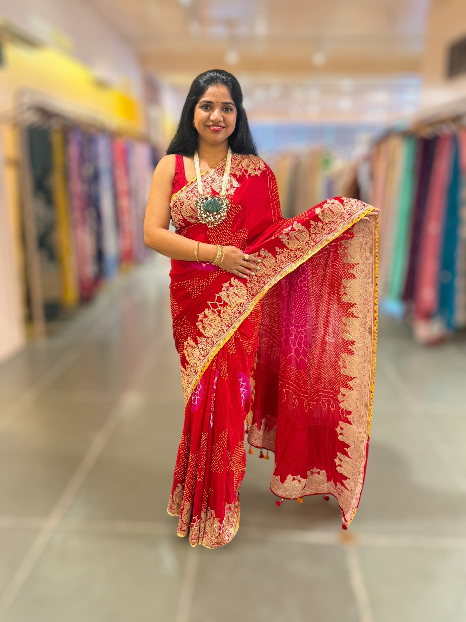 Red Rai bandhej Saree With Embroidered Border