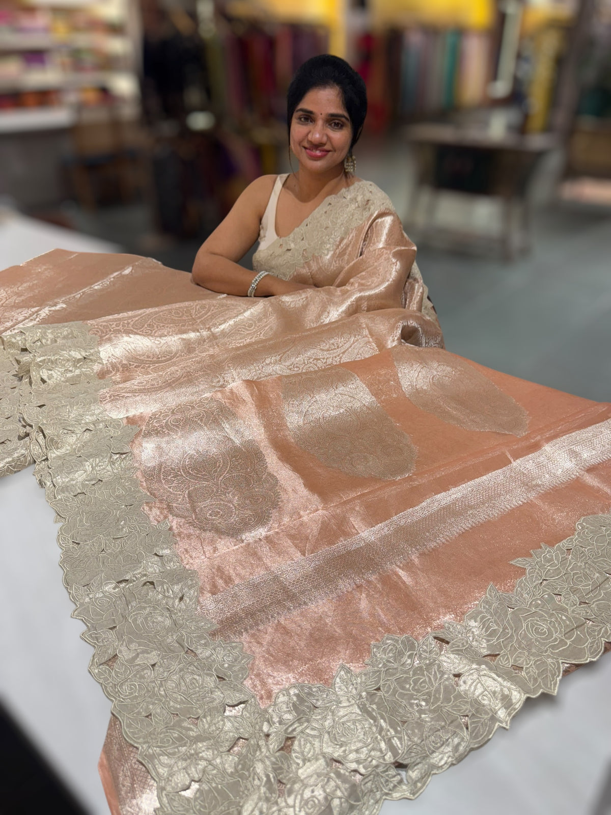 Peach Tissue Brocade allover weaving Saree with Tissue Cutwork Rose Border