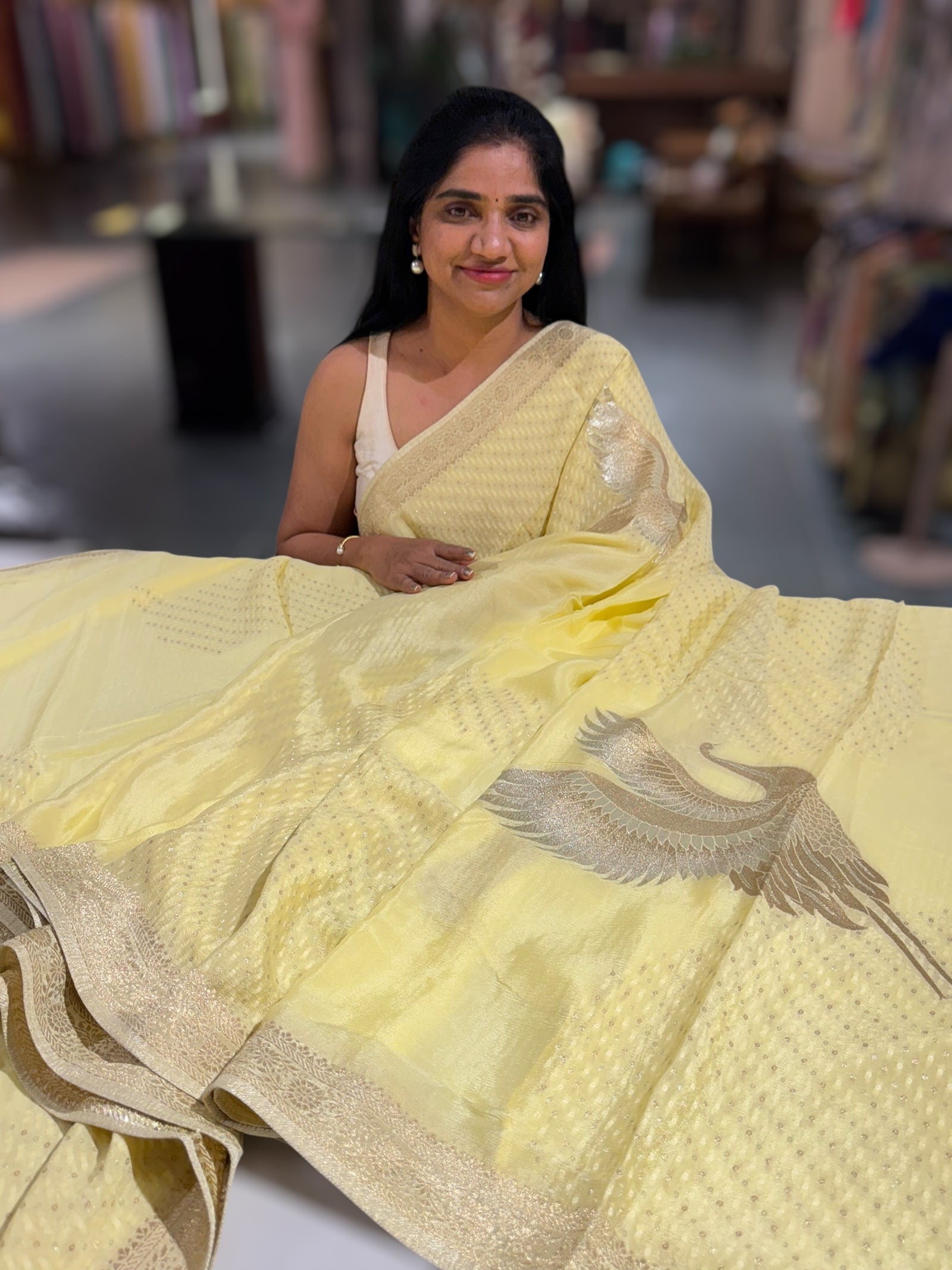 Pastel yellow banarasi chifoon  with bird weaving