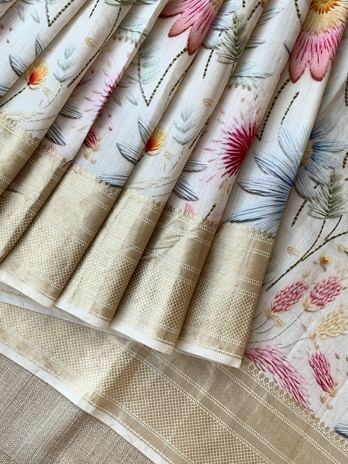 Ivory Pure Handloom Chiniya Silk Saree with stunning Floral Print and zari borders