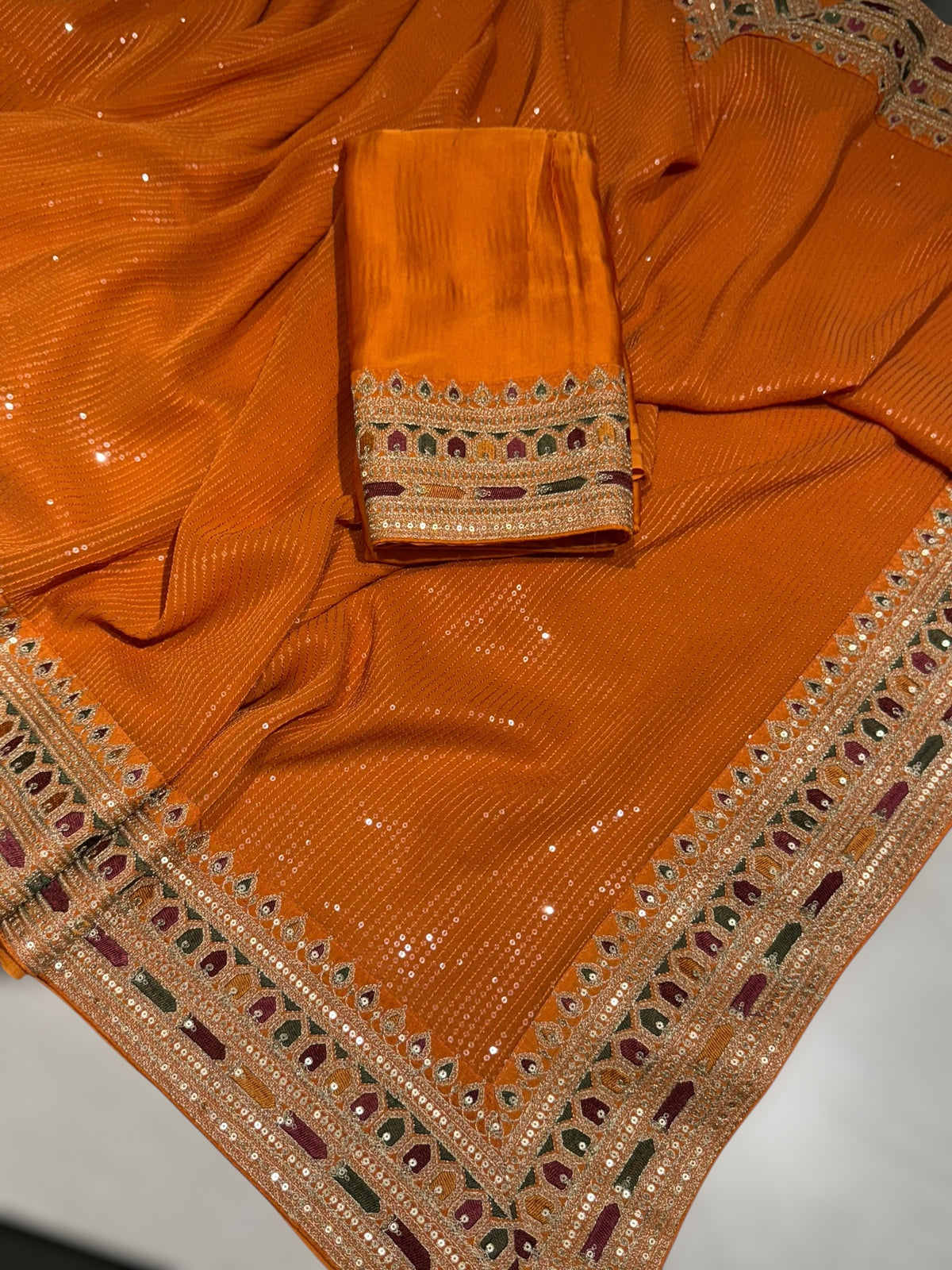 Orange Georgette sequnce Saree with Sabyasachi borders