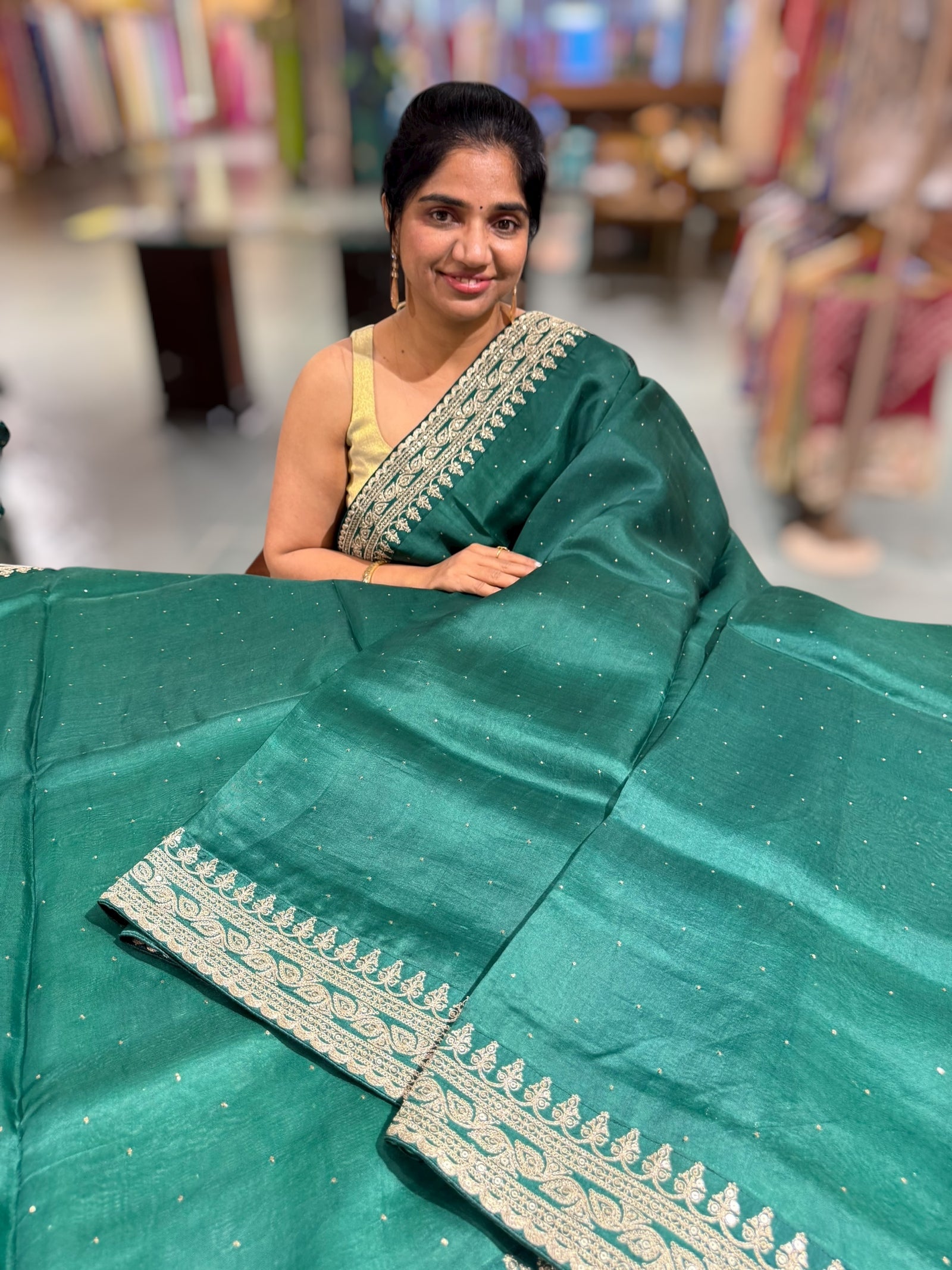 Emerald Green Pure Organza Saree with allover mukaish work & sabyasachi borders