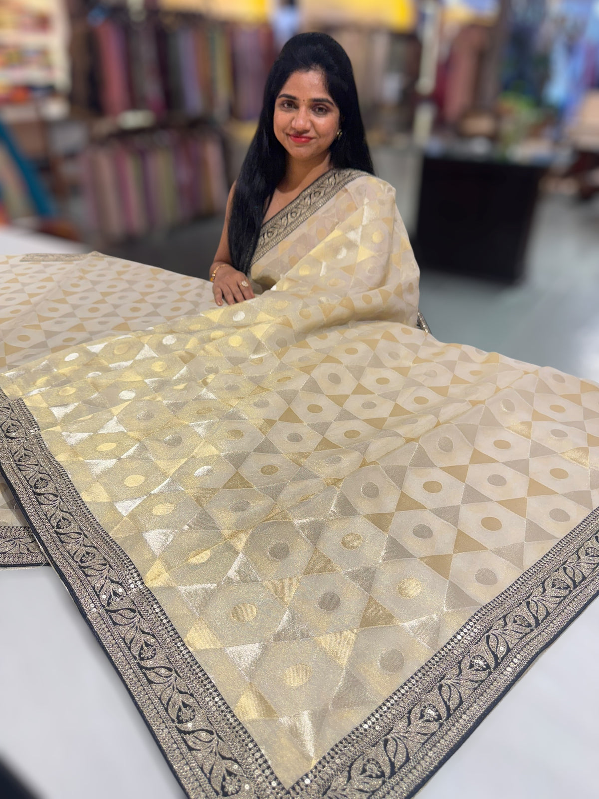 Beige Tissue Saree with Black Sabhyasachi borders