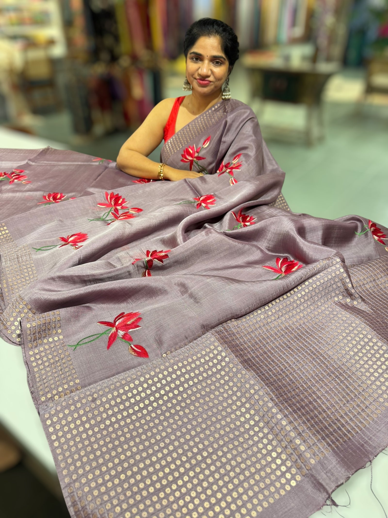 Mauve pure handloom tussar byloom saree with lotus embroidered bunch motifs