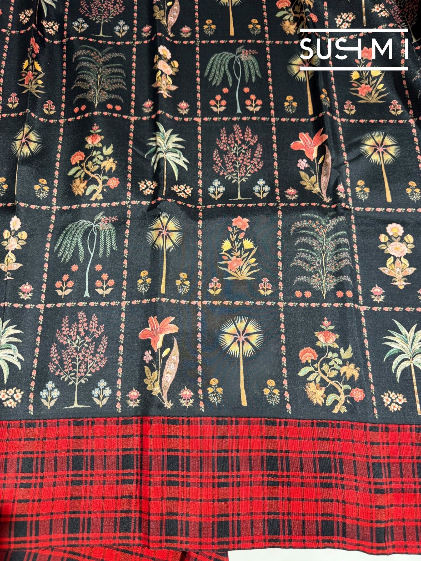 Black printed soft silk saree with burberry checks border : D62F035