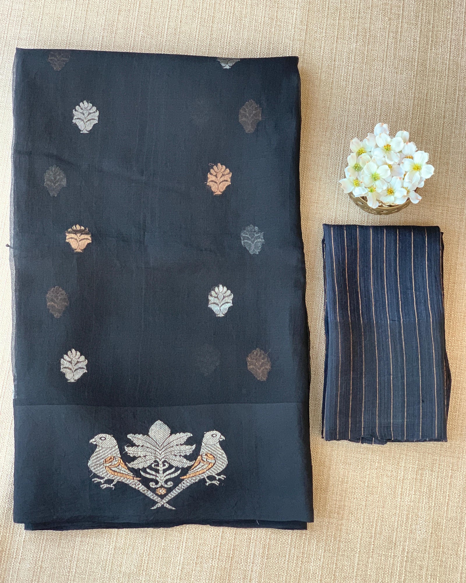 Black kora muslin sarees with kaduwa woven nandi motif border