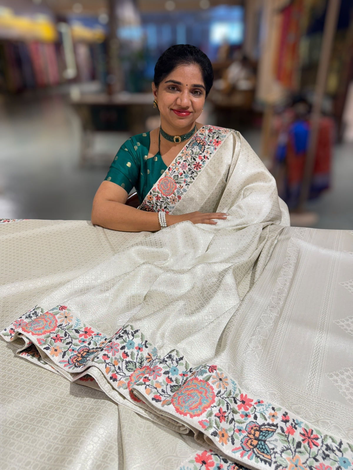 Half White Banarasi  brocade Silk Saree with Petite Point Embroidered Border.