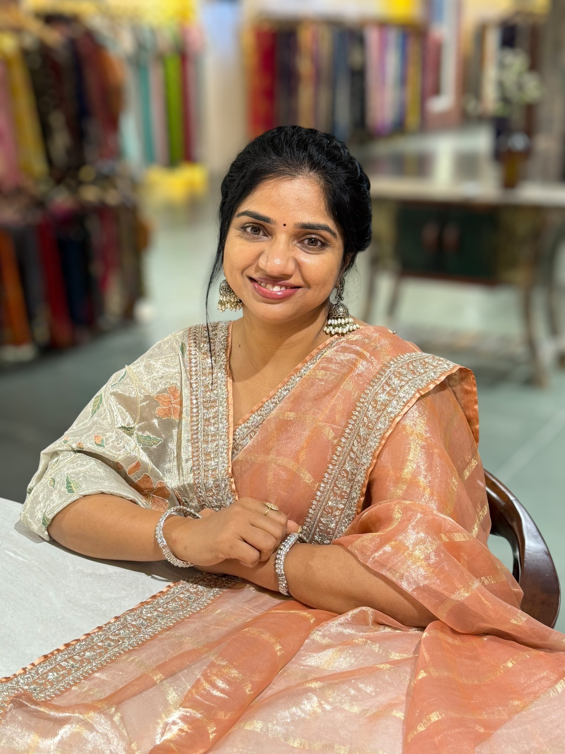 Peach Banarasi Tissue checks Saree with Sabyasachi Borders