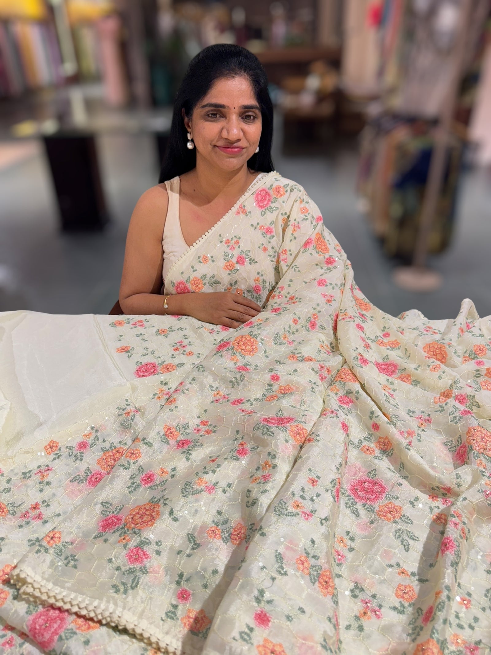 Ivory Chinnon saree with allover petite point embroidery