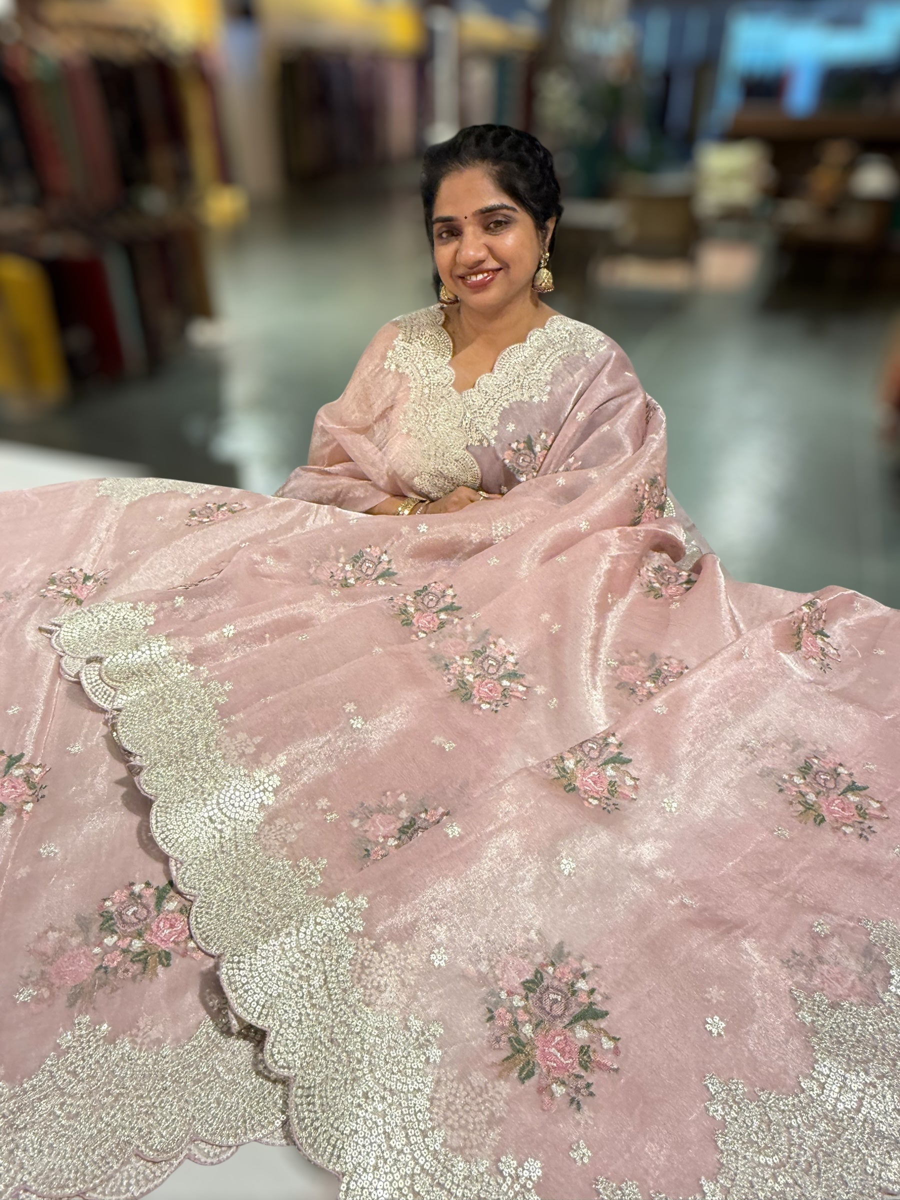 Pink Tissue Saree With allover Petite Point Motifs & Pittai Sequnce Borders