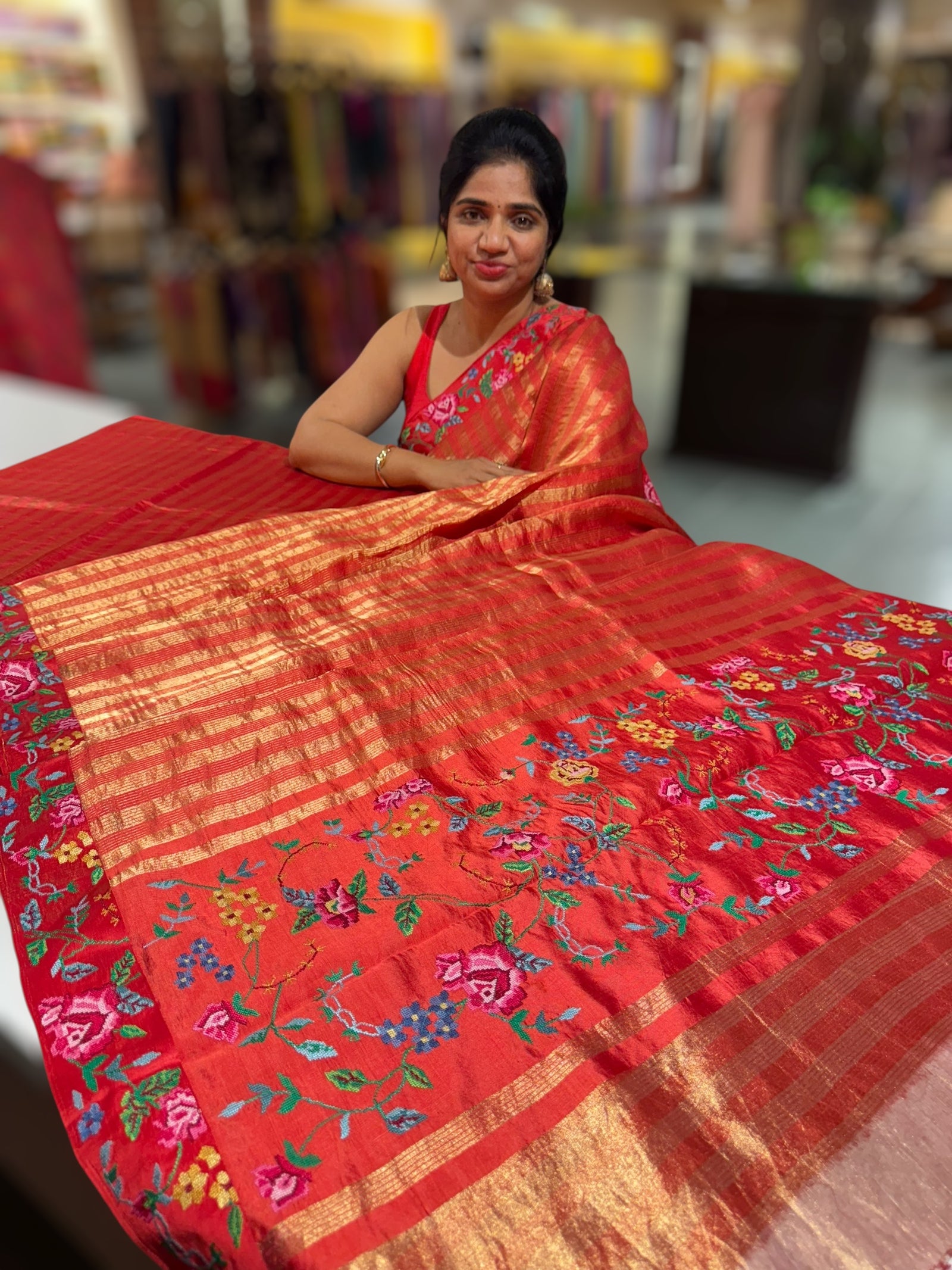 Orangish Red Banarasi Tissue stripes Saree with petite point embroidery