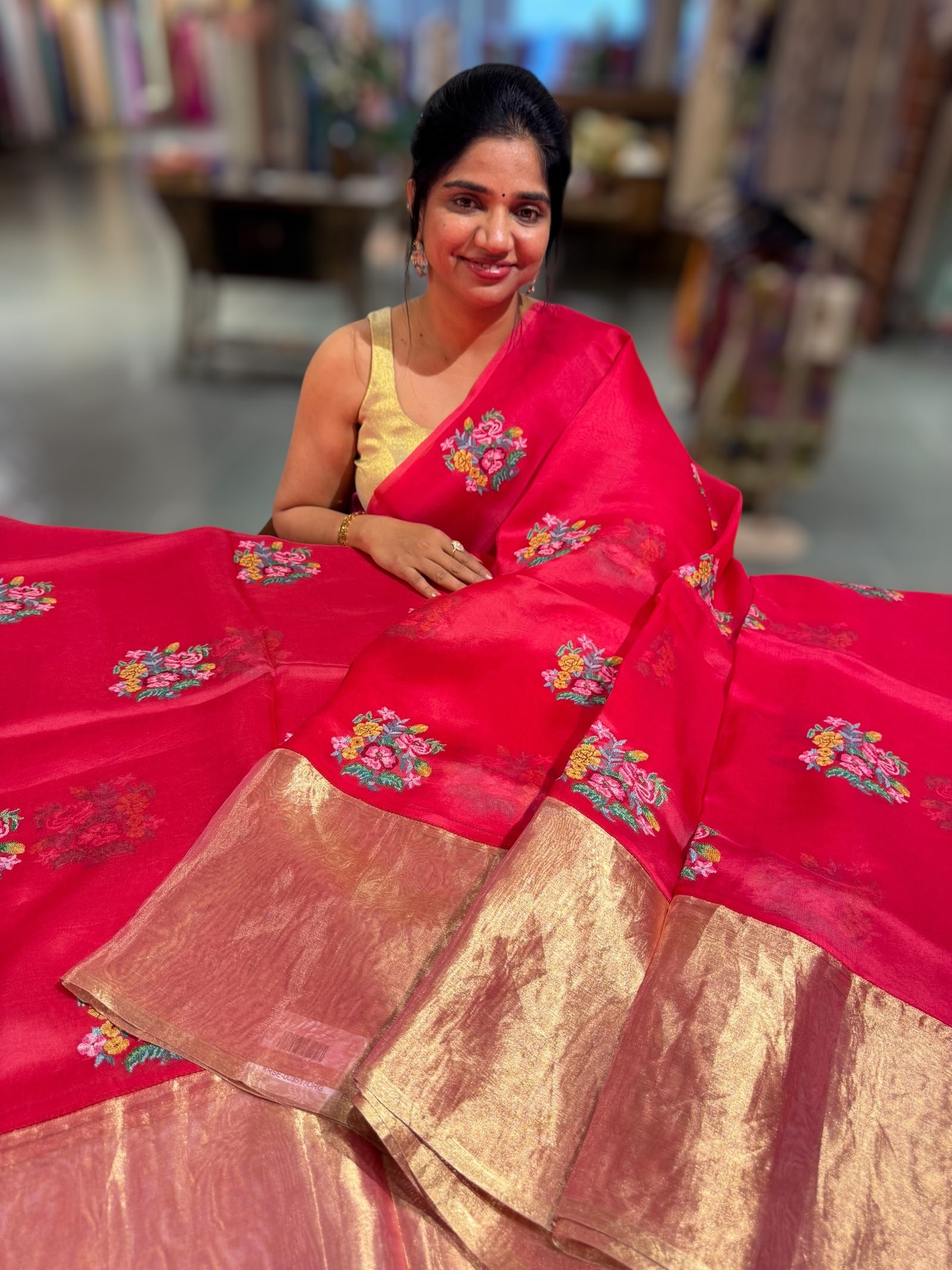 Pinkish Red Organza Saree with pure Tissue Border